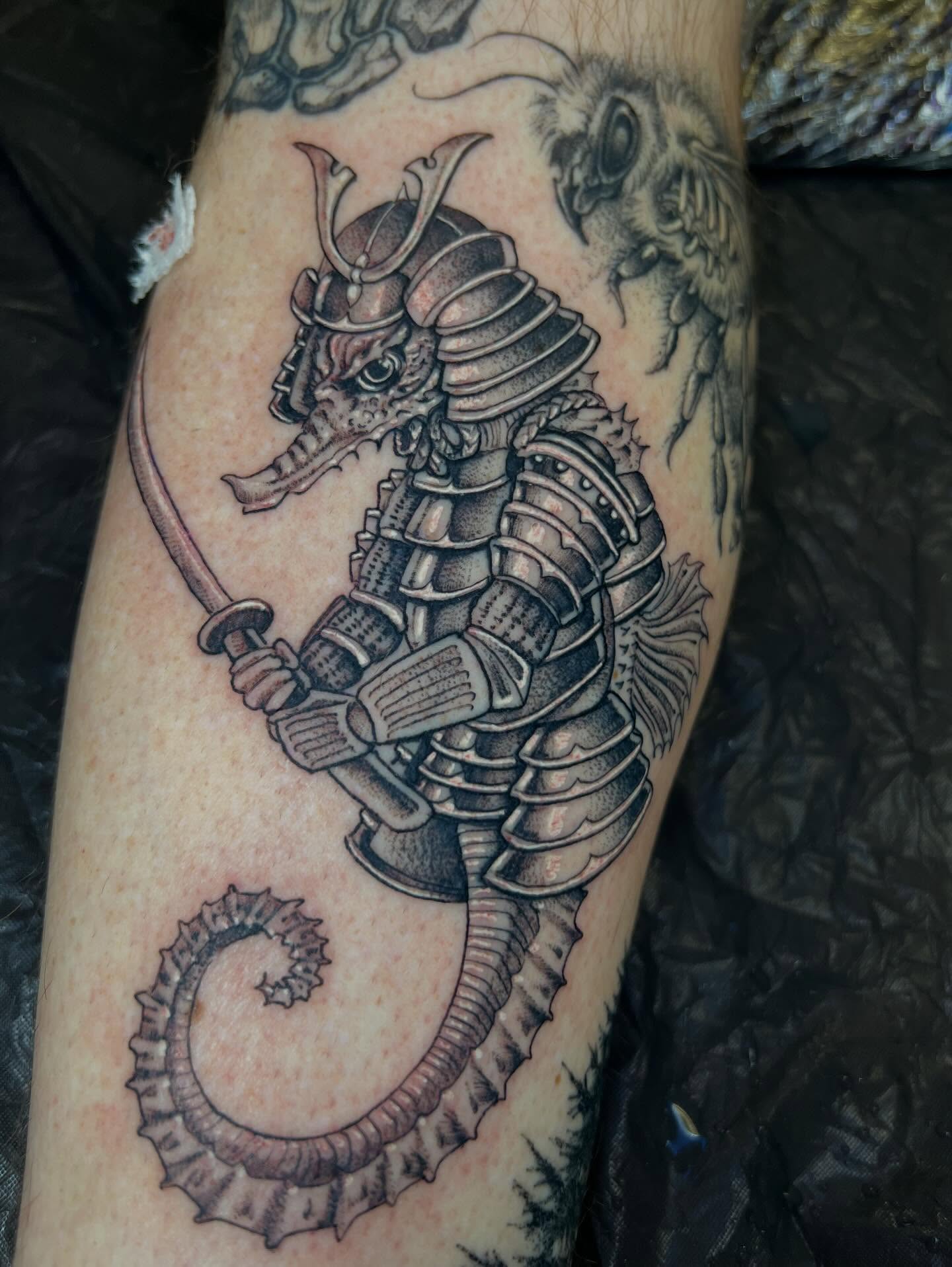 Tattoo by @tallartist — black_and_grey, realism