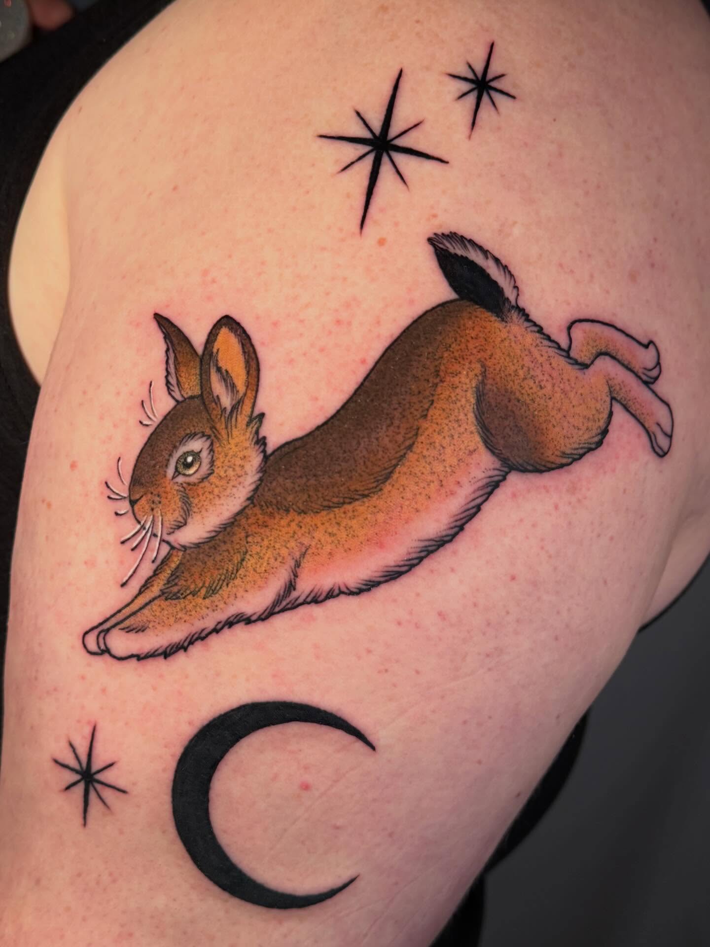 Hare jumping realism tattoo on the shoulder by leanna patterson, Ruston, Louisiana
