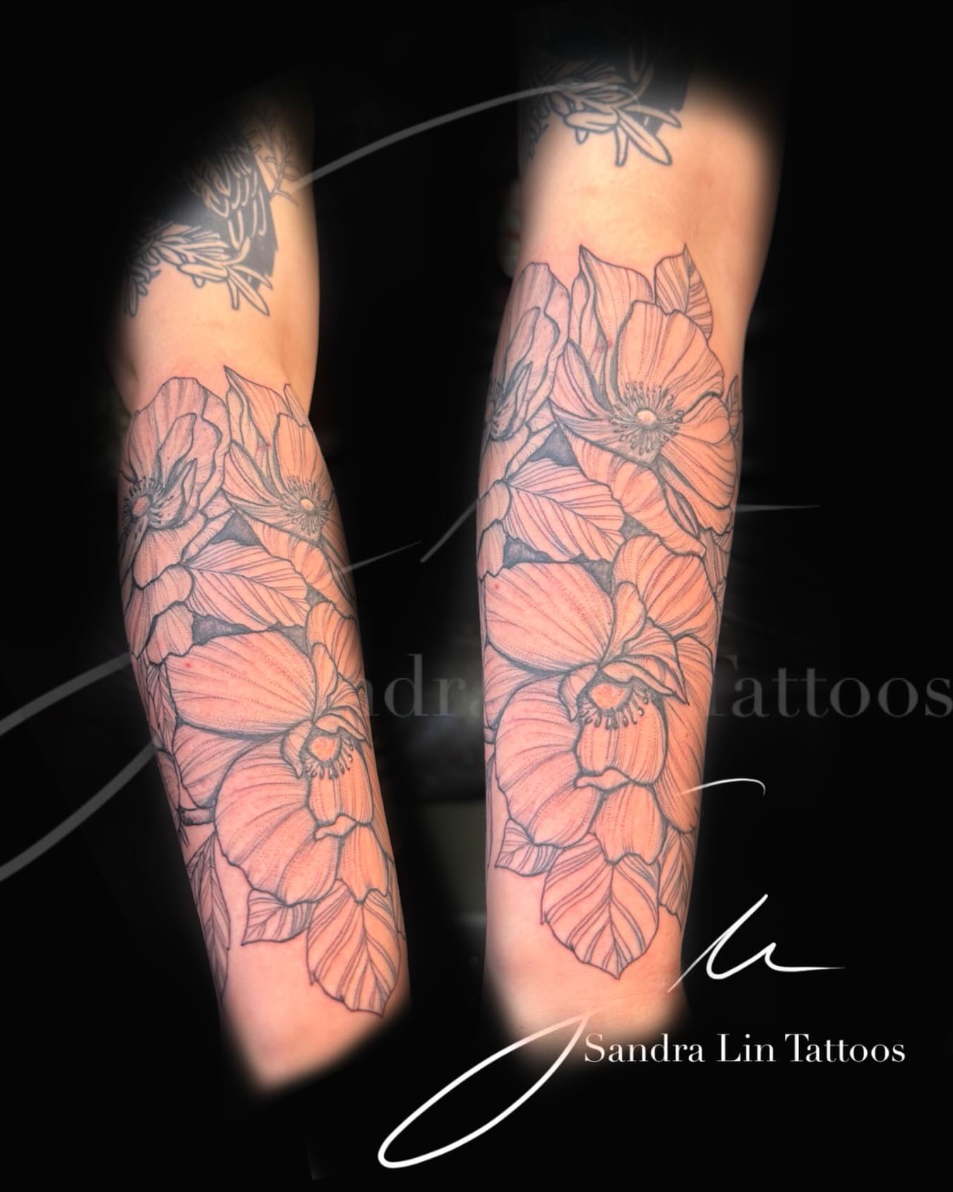 Flowers black and grey tattoo on the forearm by Sandra Lin Cue