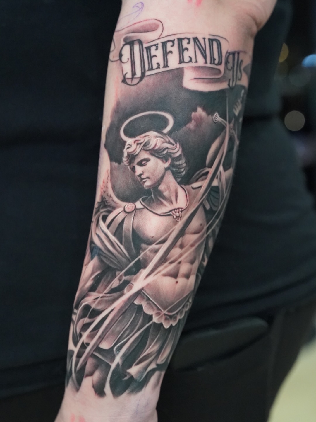 Angelic warrior realism tattoo on the forearm by Luis Rodriguez