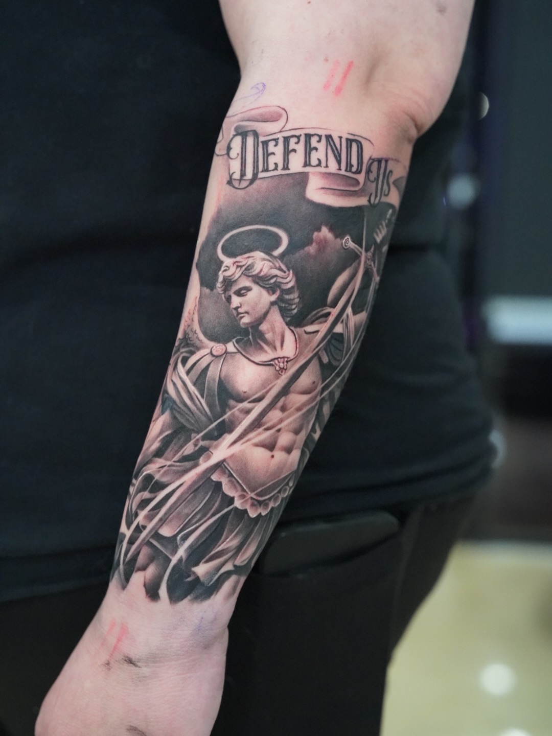 Angel with sword realism tattoo on the forearm by Luis Rodriguez