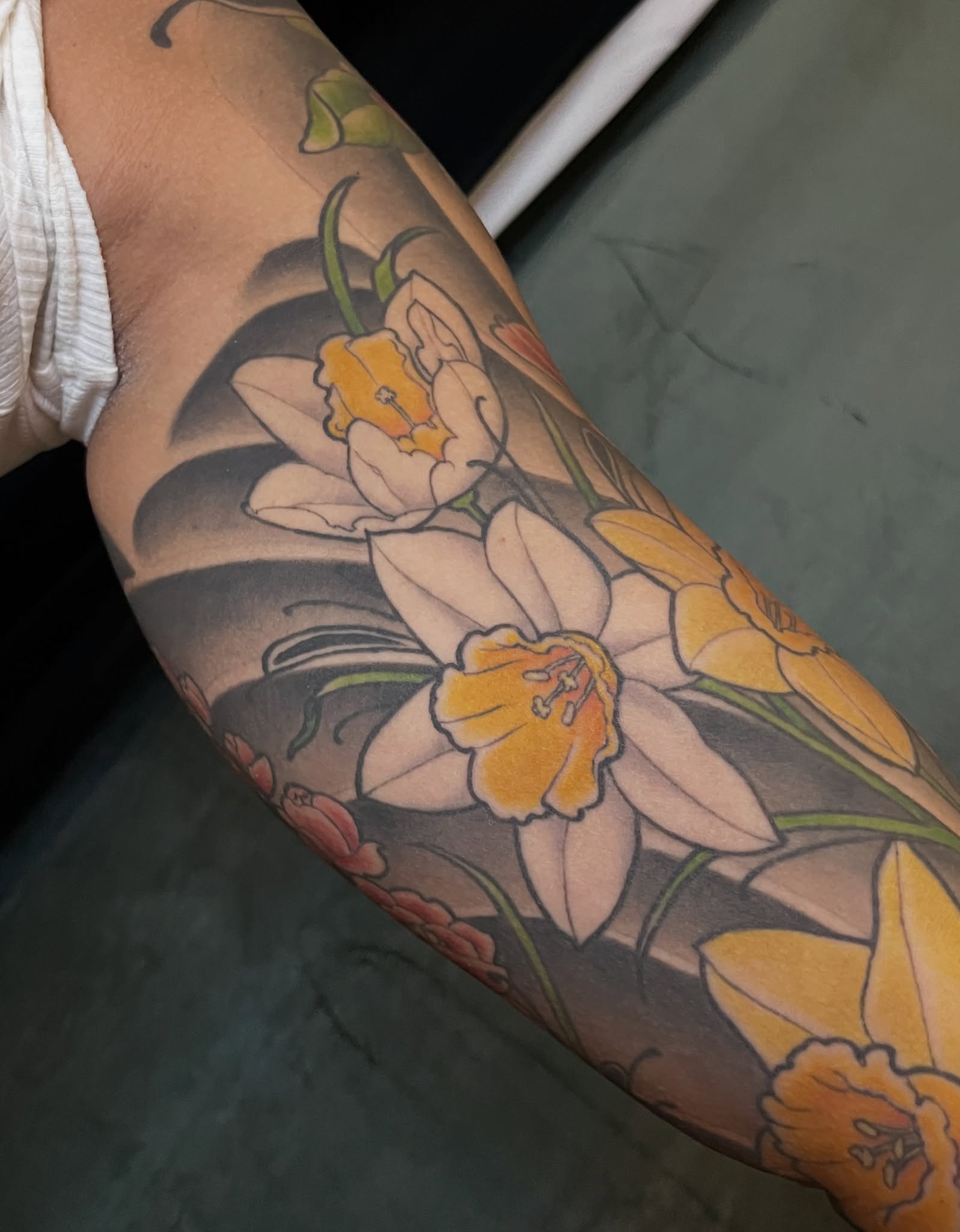 Daffodils realism tattoo on the forearm by BELLIE ✧ Tattoo Artist