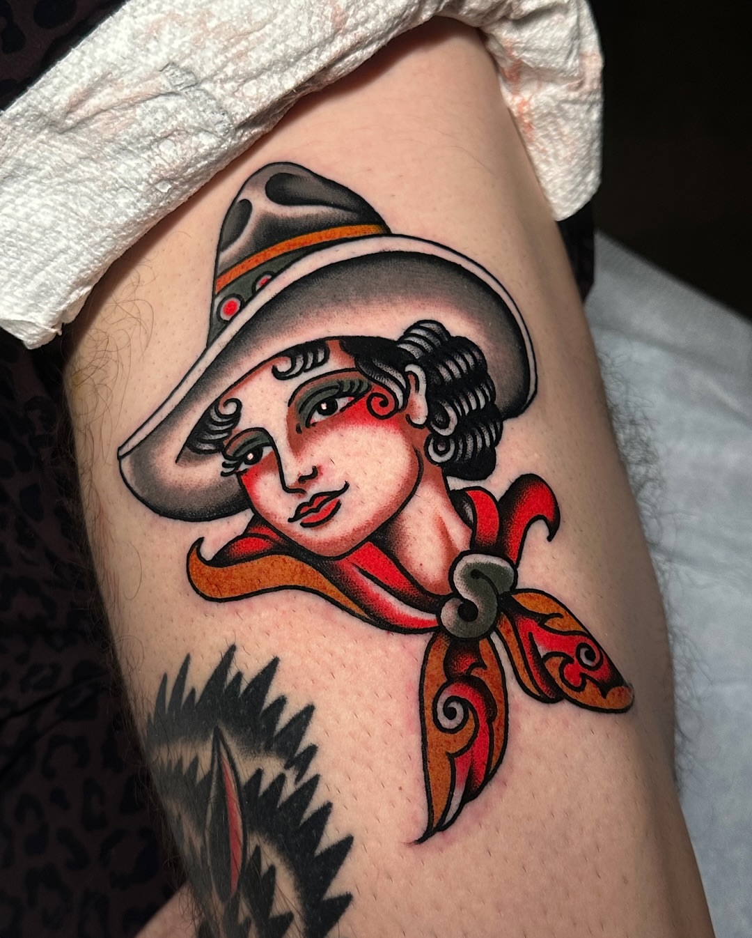 Flapper girl American traditional tattoo on the thigh by Tony Perez- Austin Texas Tattooer