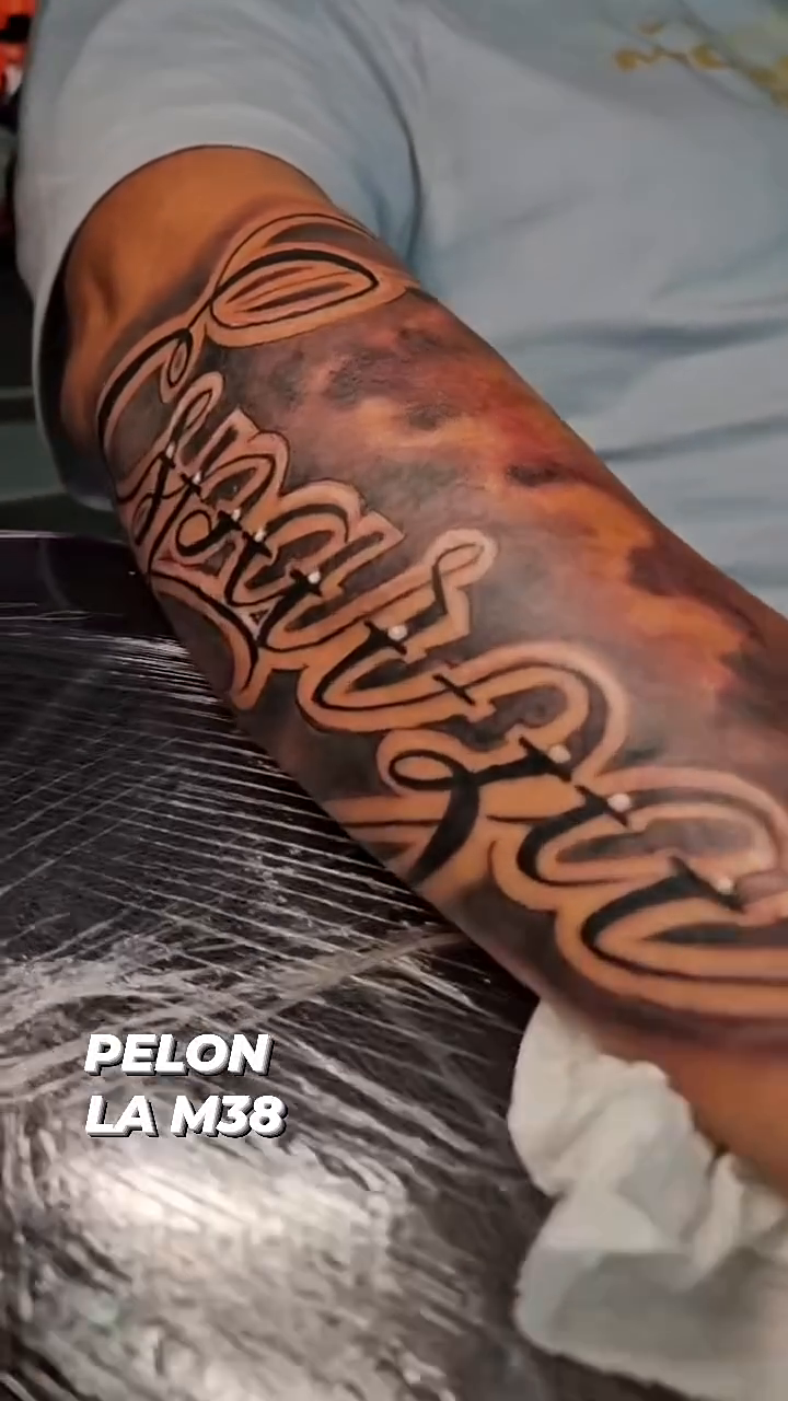 Caparzia lettering script tattoo by Aguascali Firme