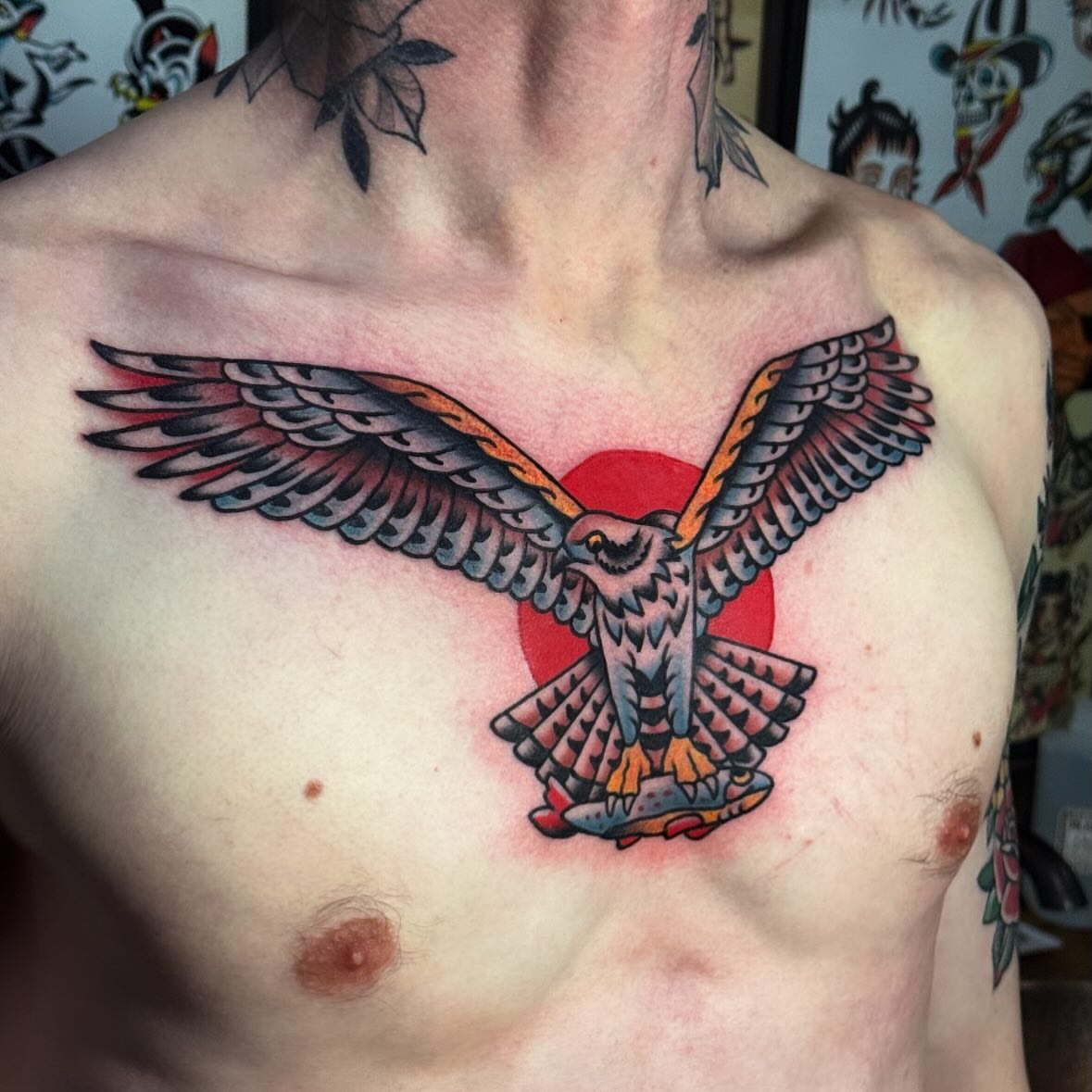 Flying bird American traditional tattoo on the chest by Larry Love