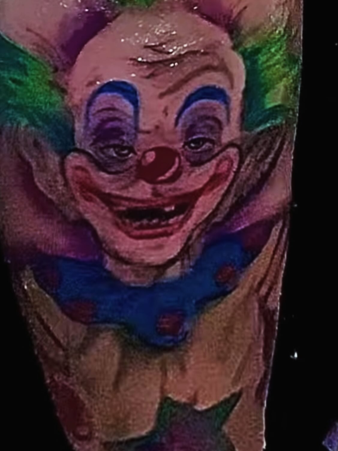 Clown realism tattoo on the forearm by Gessel Leticia Enriquez