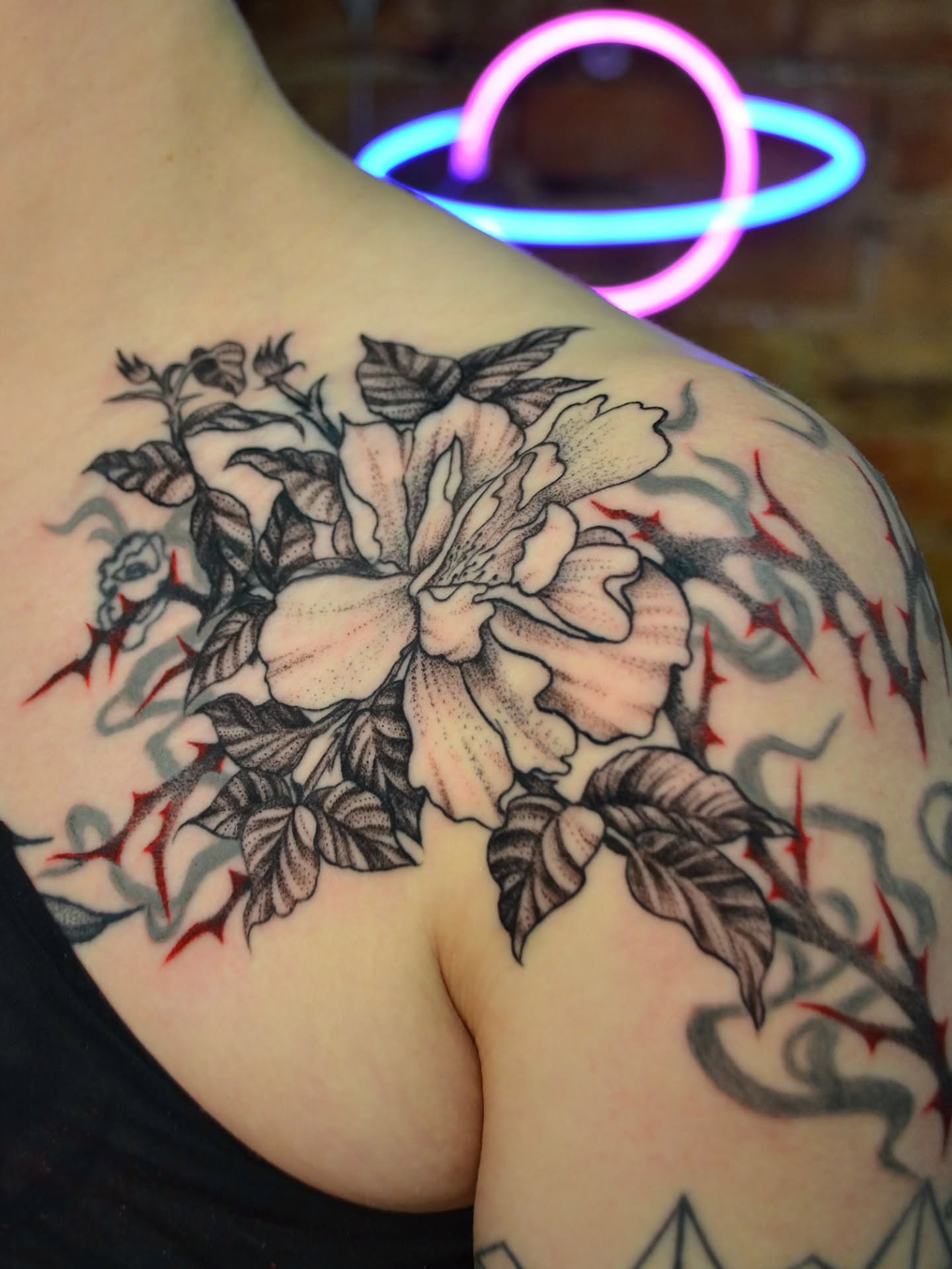 Flower and thorns black and grey tattoo on the shoulder by bird ✦ tattoo artist ✦ philadelphia