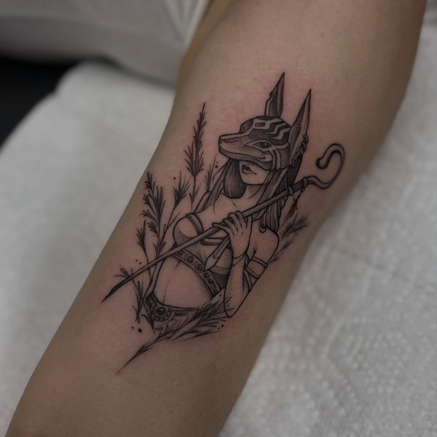 Ancient Egyptian deity black and grey tattoo on the forearm by Genevieve Ehlers, Denver, Colorado