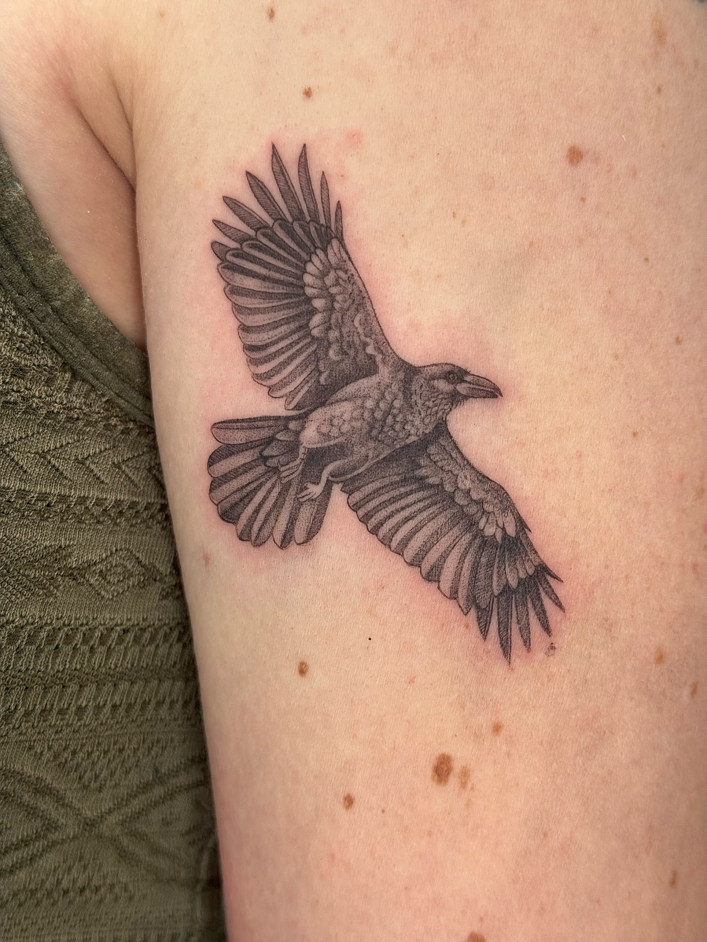 Crow black and grey tattoo on the forearm by Lea Burkard, Berkeley, California