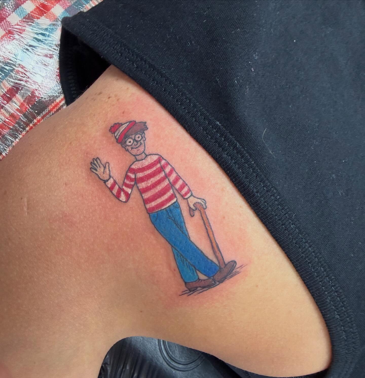 Where's Waldo? illustrative tattoo on the thigh by Olivia Norbert