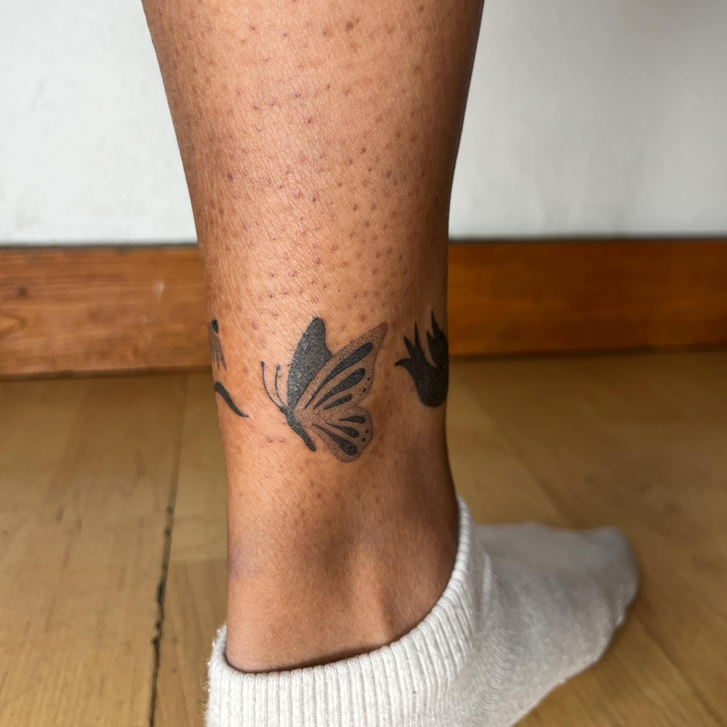 Butterfly dotwork tattoo on the calf by natalie