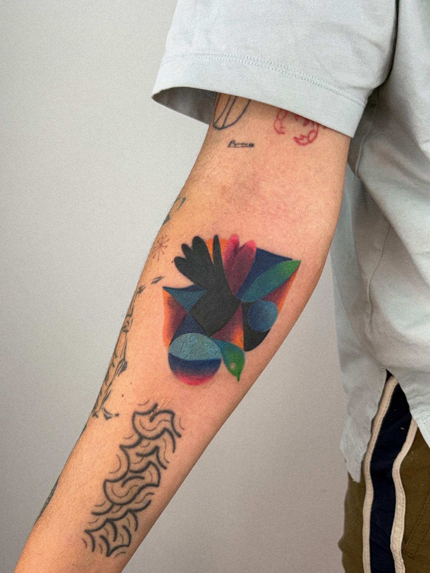 Abstract geometric shapes geometric tattoo on the forearm by júlia sanches ✦︎