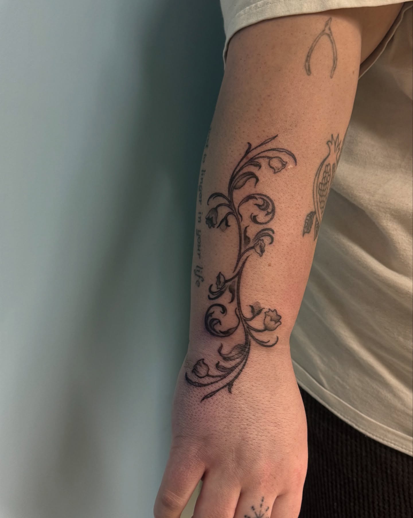 Floral vine ornamental tattoo on the forearm by Eva, Matawan, New Jersey