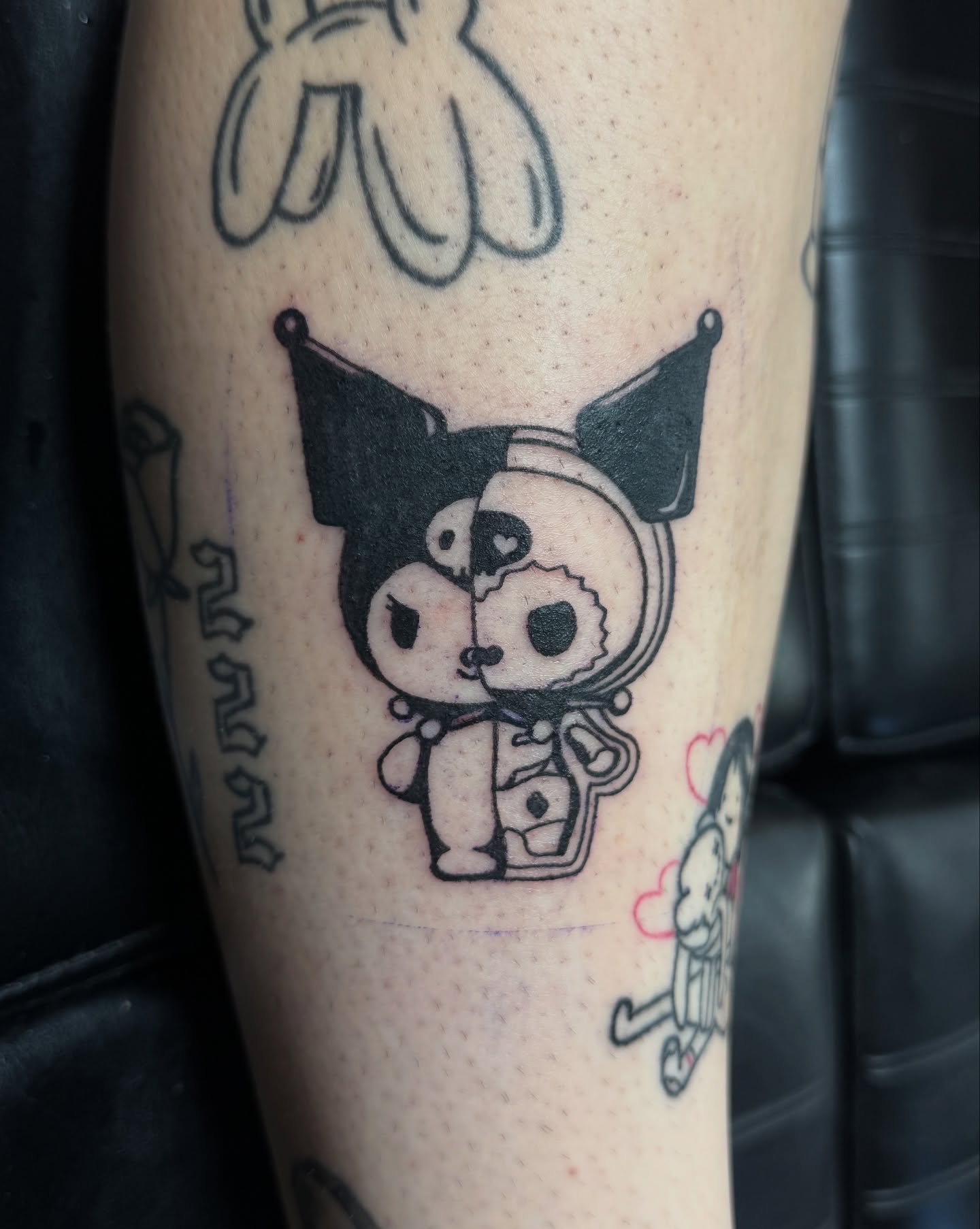 TOKIDOKI characters black and grey tattoo on the forearm by Eva, Matawan, New Jersey