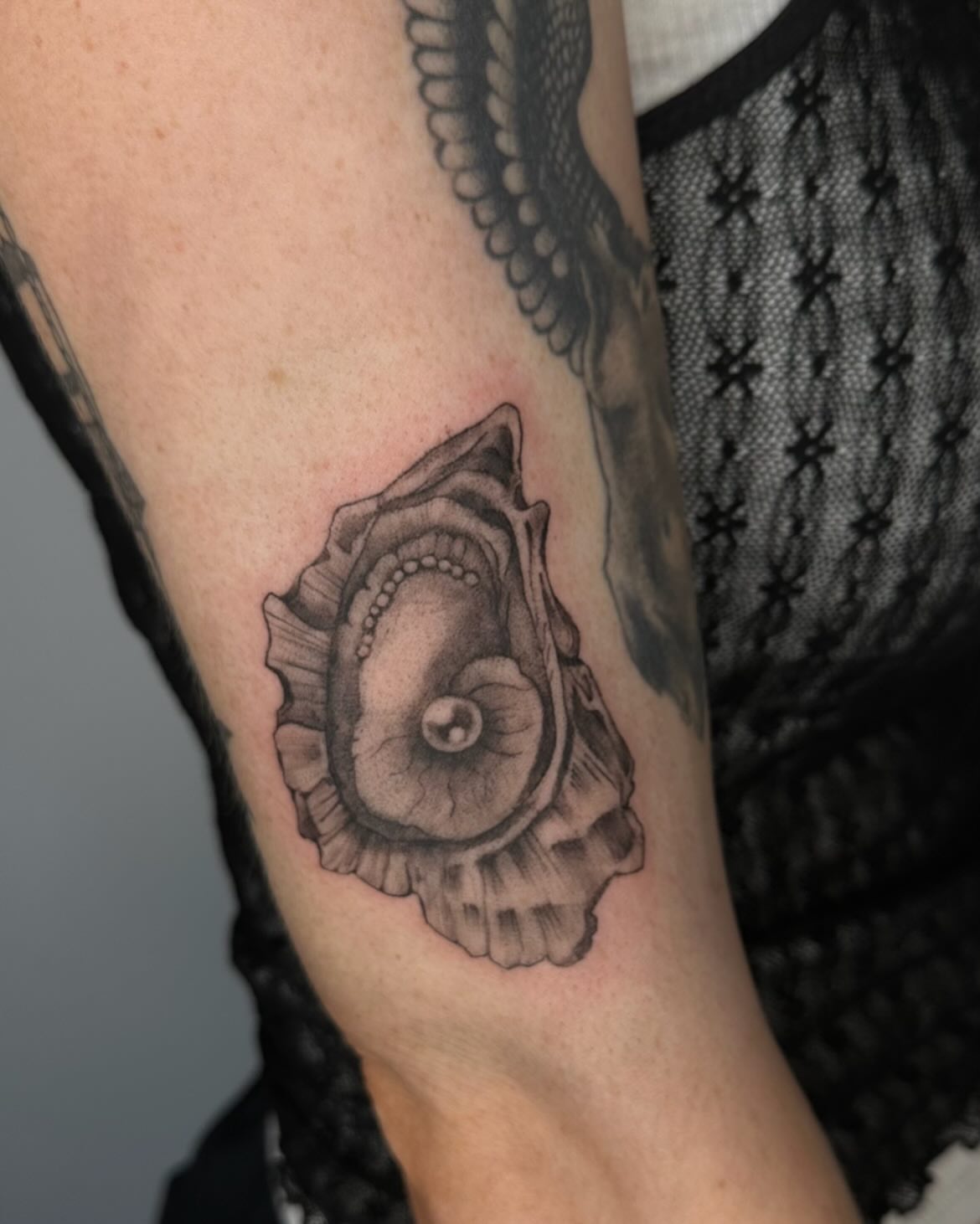 Eye realism tattoo on the forearm by Sadie Spades Philly Tattoos