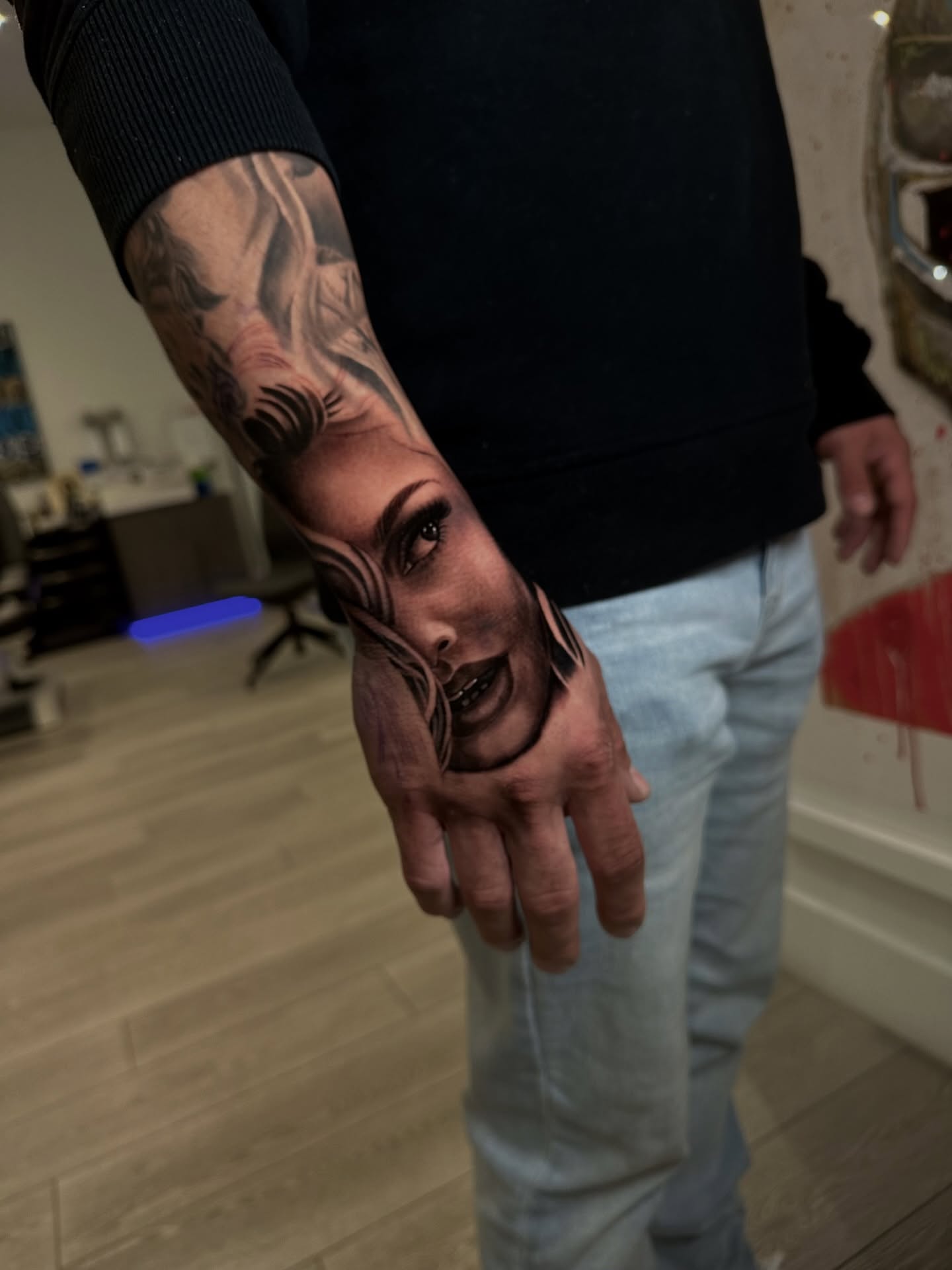 Woman's face realism tattoo on the forearm by Yudel
