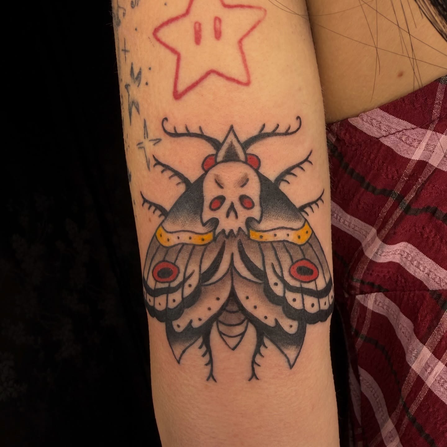 Moth with skull head American traditional tattoo on the forearm by Kaysen