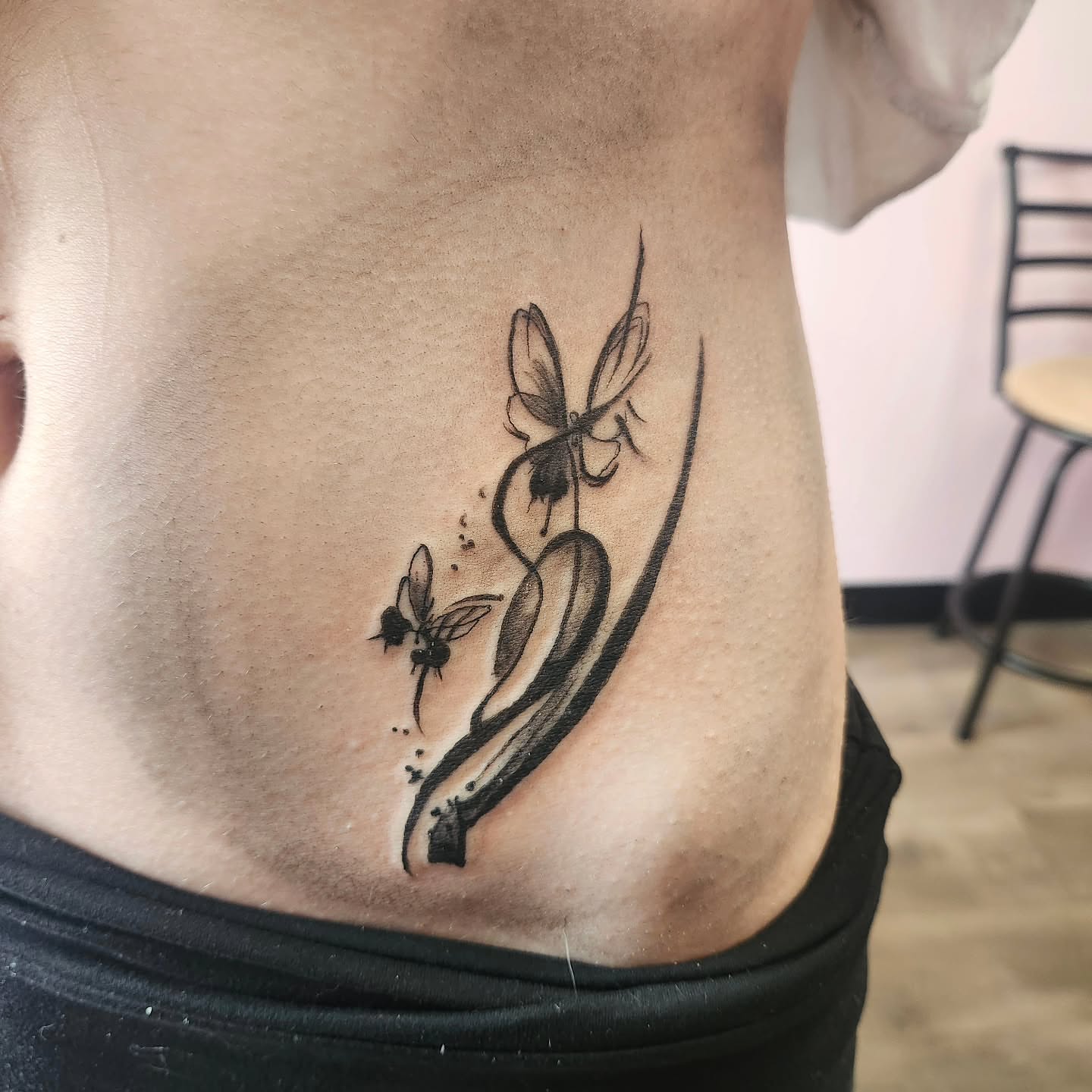 Butterfly and fly black and grey tattoo on the ribs by Meredith 🎈 Tattoo the Bride ✝️