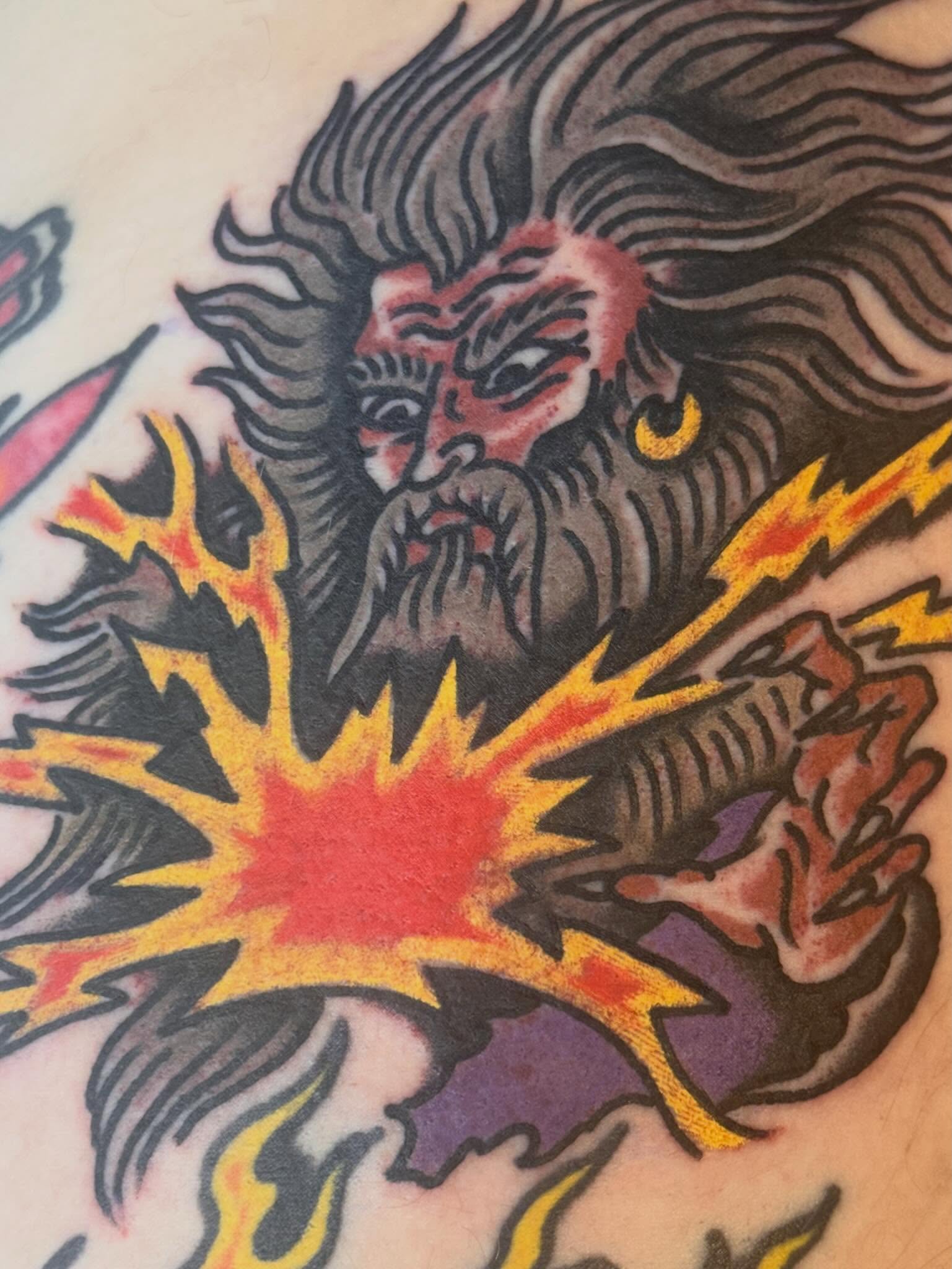 God-like figure American traditional tattoo on the chest by Cody Woolard, Seymour, Tennessee
