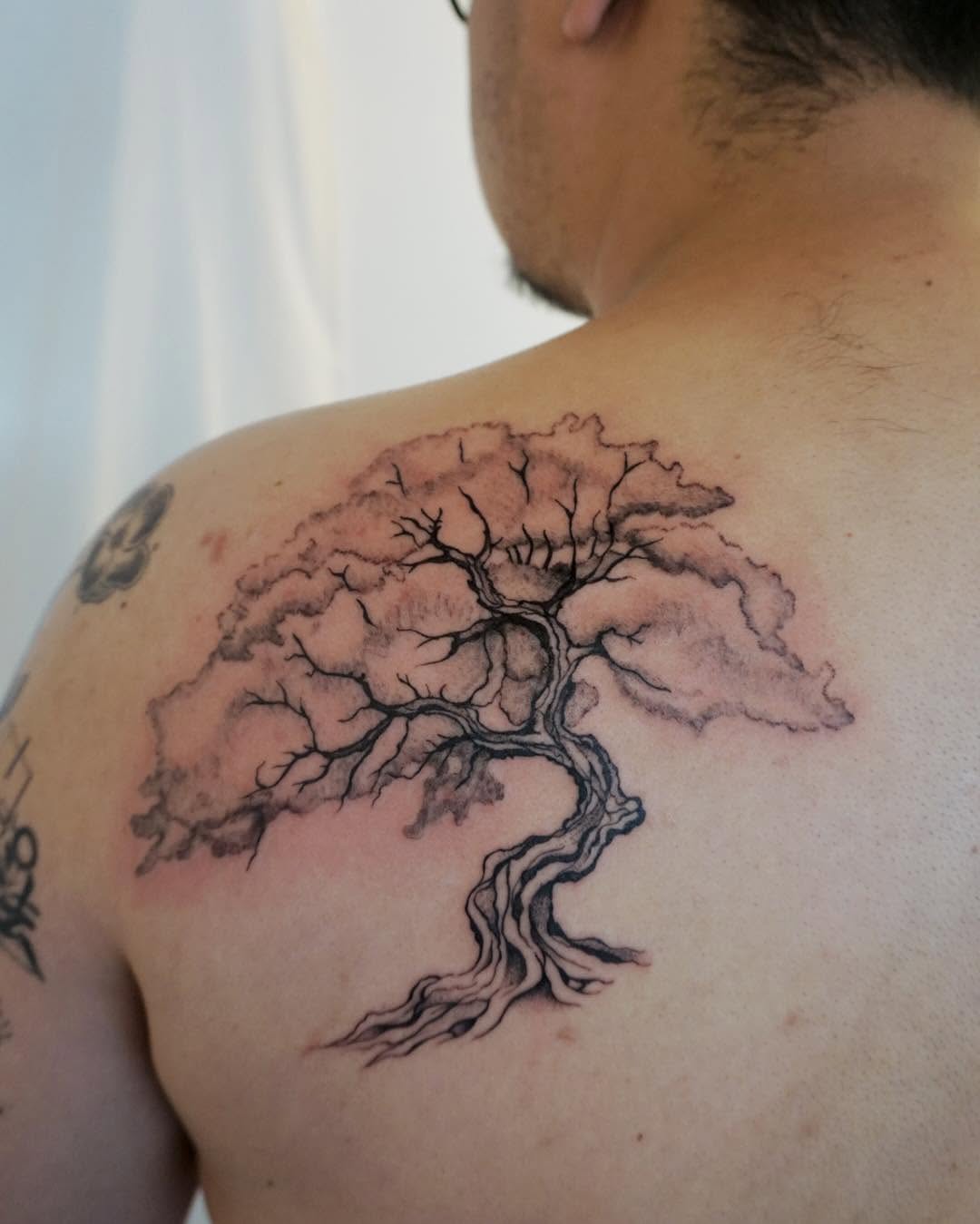 Tattoo by @yuri_tattooer — black_and_grey