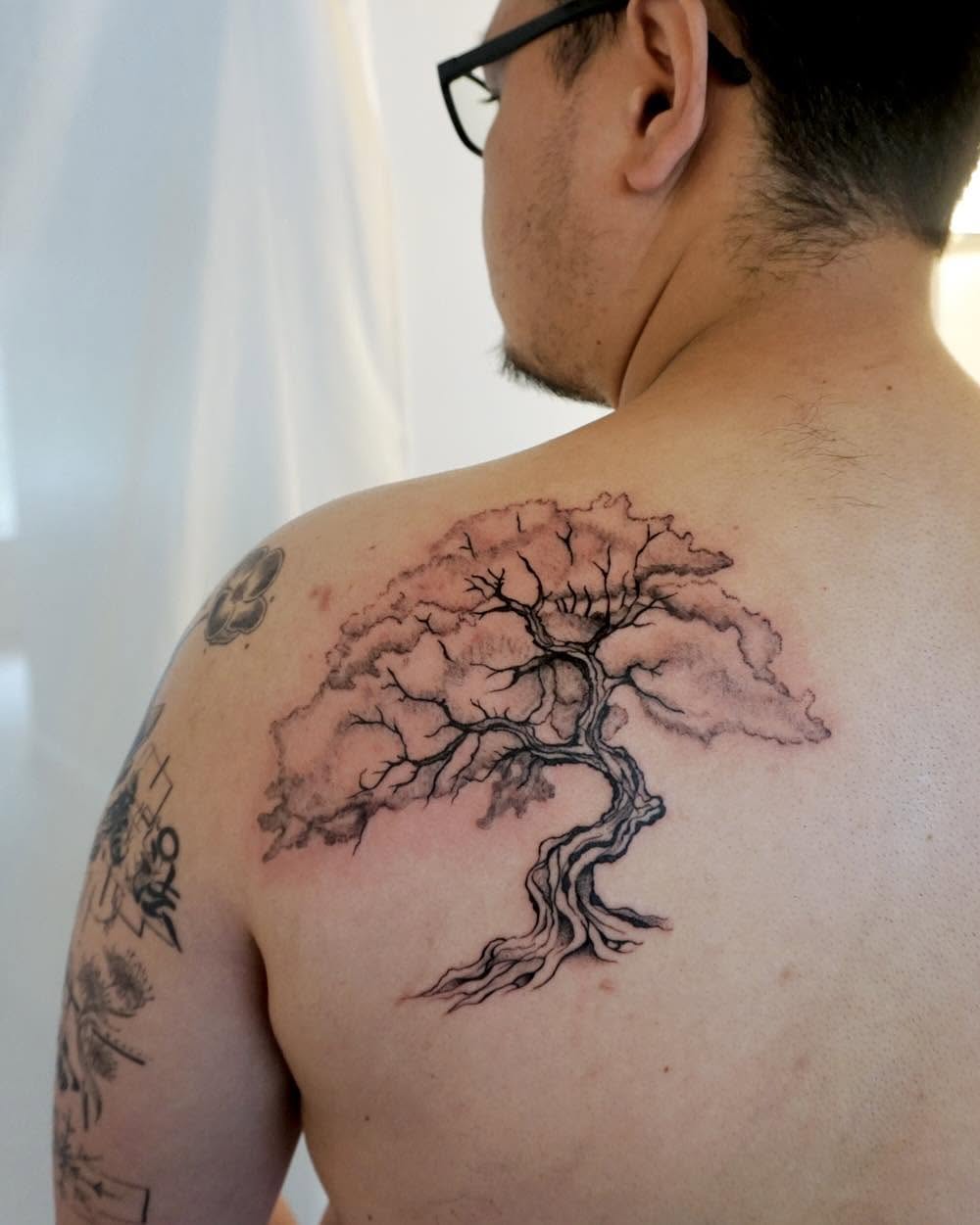 Tattoo by @yuri_tattooer — black_and_grey
