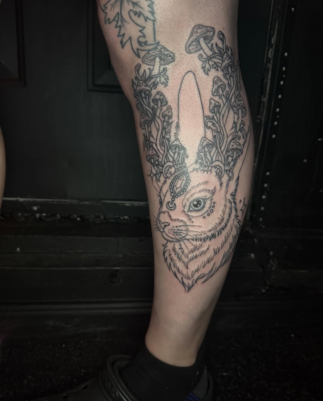 Rabbit realism tattoo on the leg by Shelby Warren