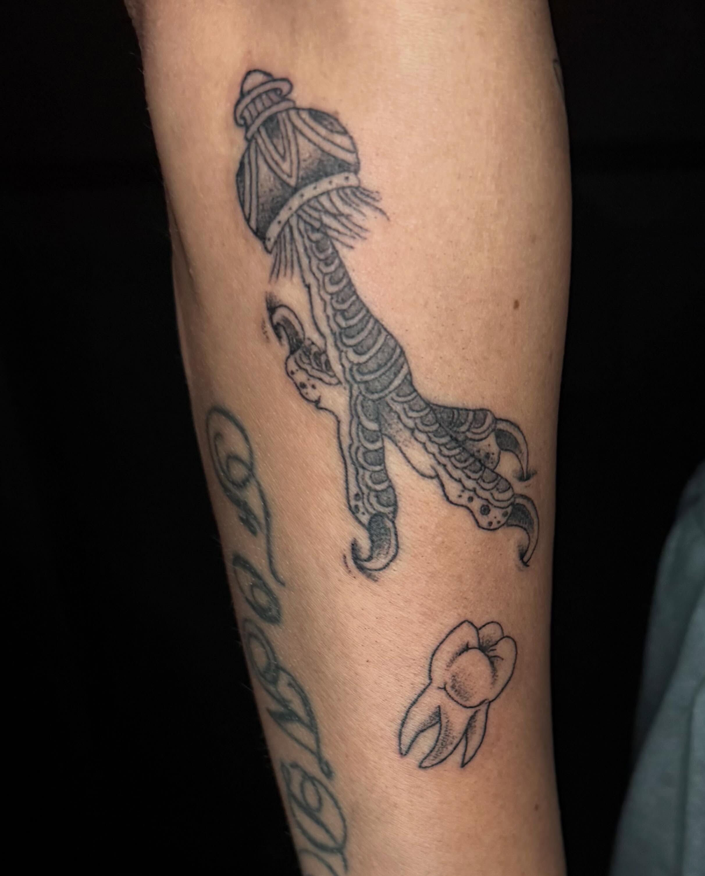 Mermaid black and grey tattoo on the forearm by Shelby Warren