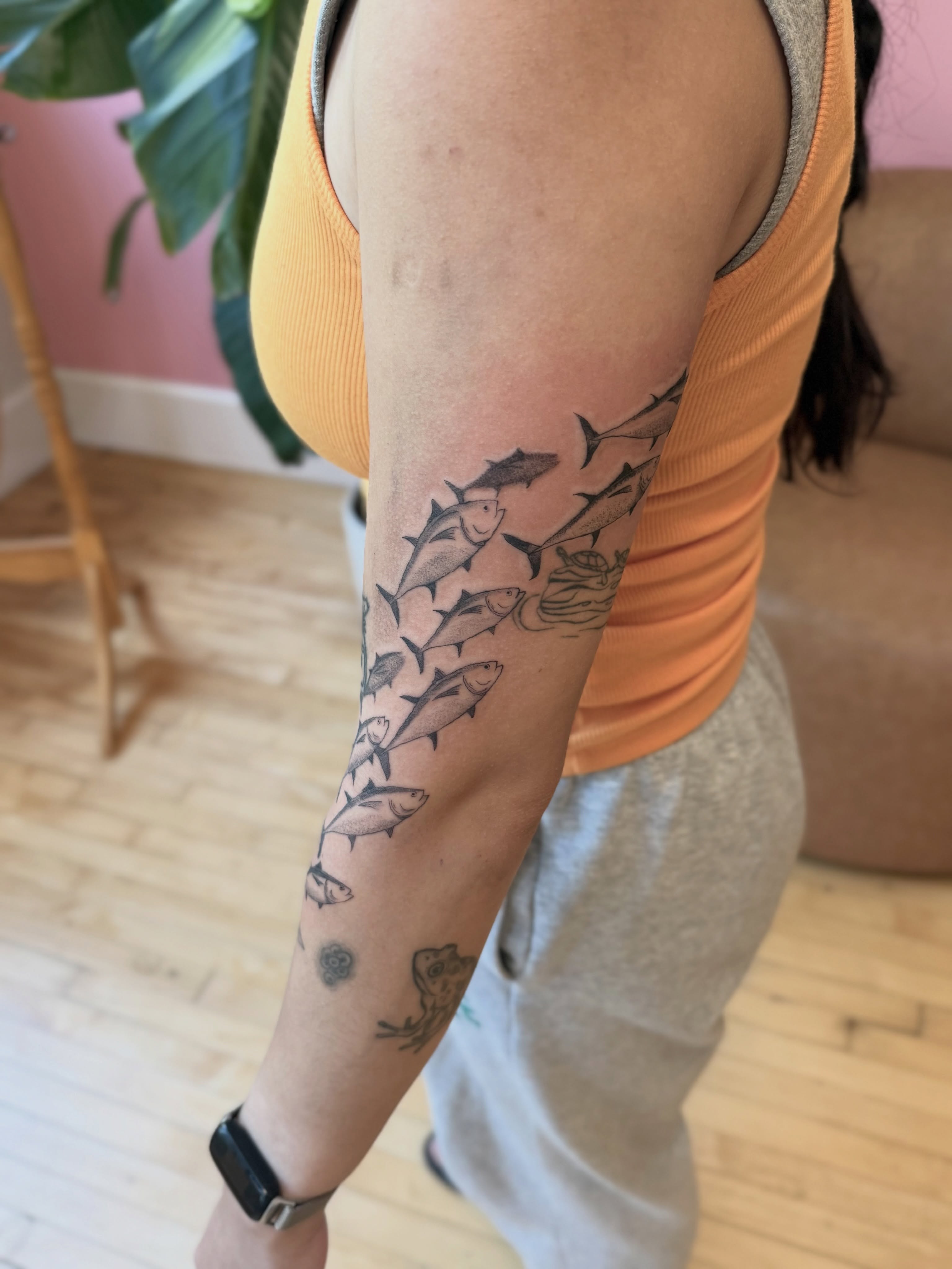 School of fish black and grey tattoo on the forearm by Kelsey Lynn▪️Raleigh Tattoo Artist