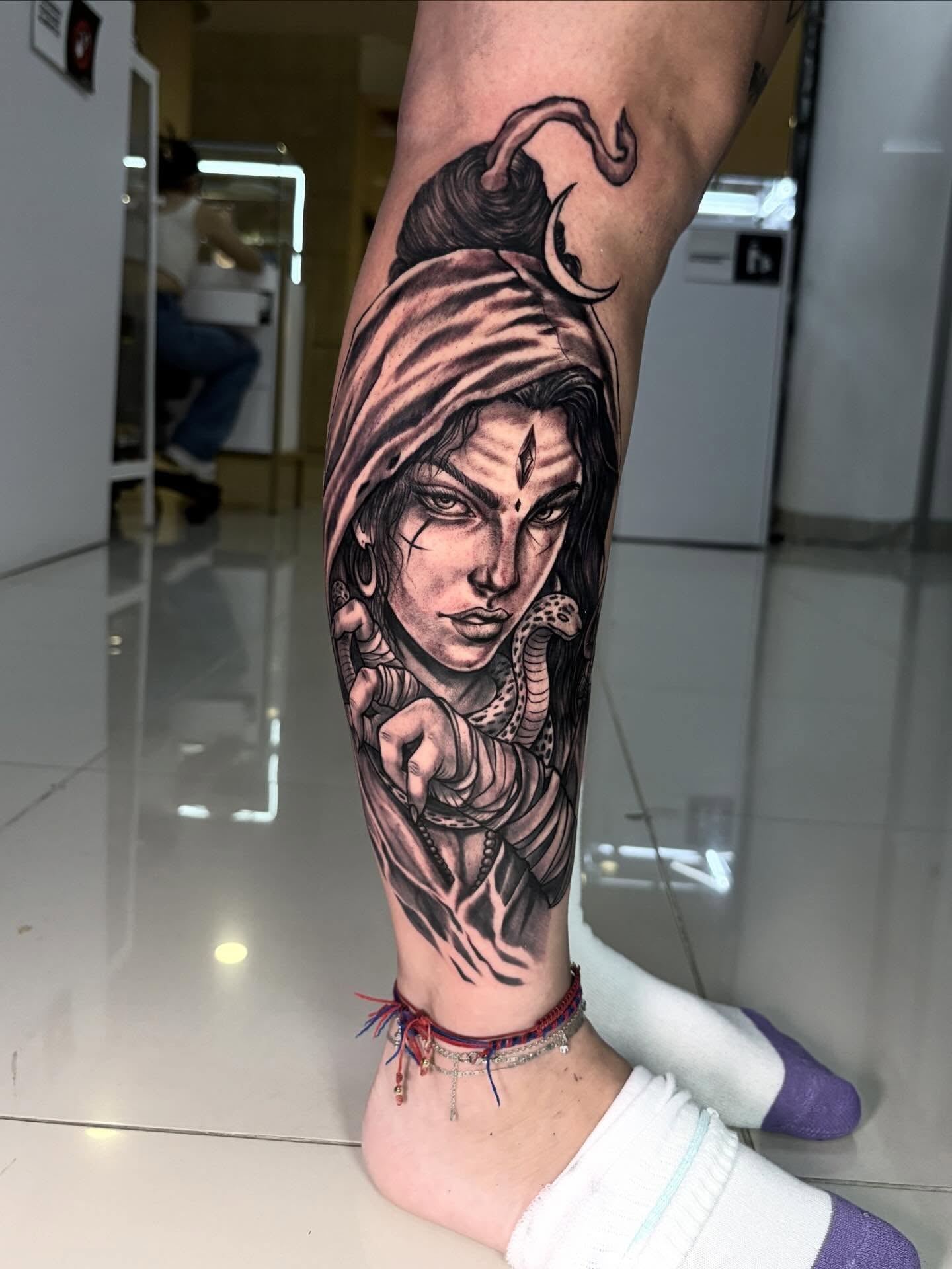 Woman with snake realism tattoo on the forearm by Tattoo Medellin