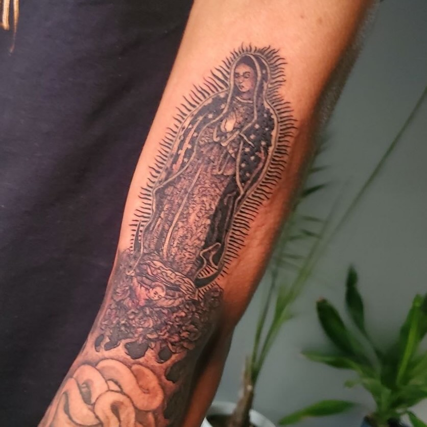 Our Lady of Guadalupe black and grey tattoo on the forearm by Matthew Ray, Harrisburg, North Carolina