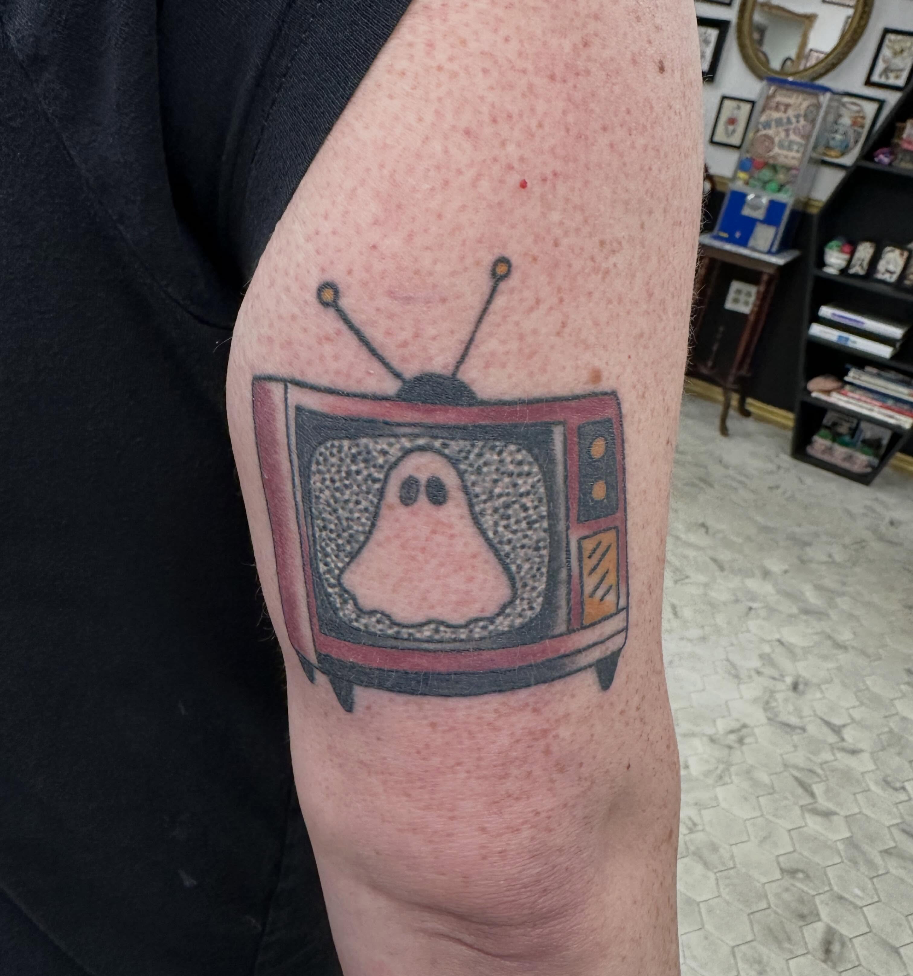 Ghost on television dotwork tattoo on the forearm by Nicki Hoverson