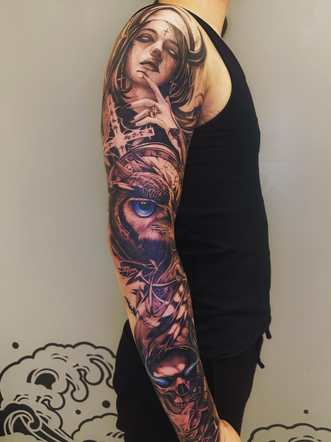 Nun, owl, skull, clock realism tattoo on the forearm by Shihao zhao