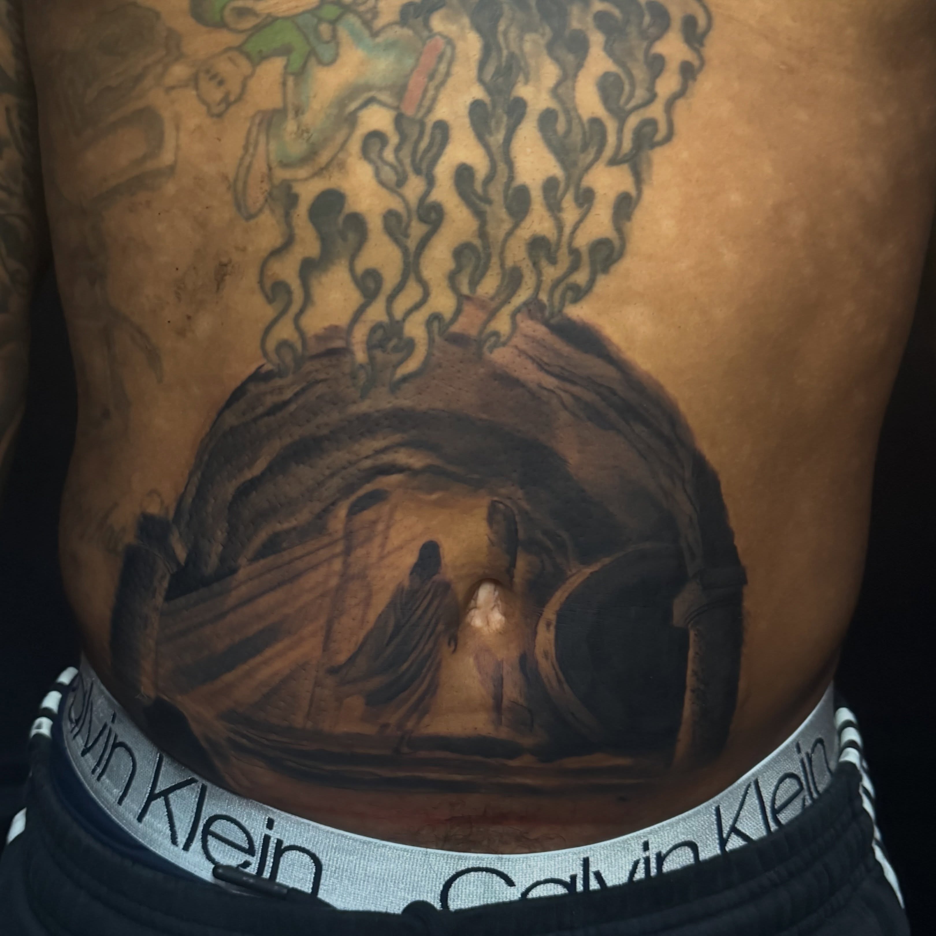 Astronaut in space realism tattoo on the torso by Elian Sanchez Austin Tx. Tattoo Artist