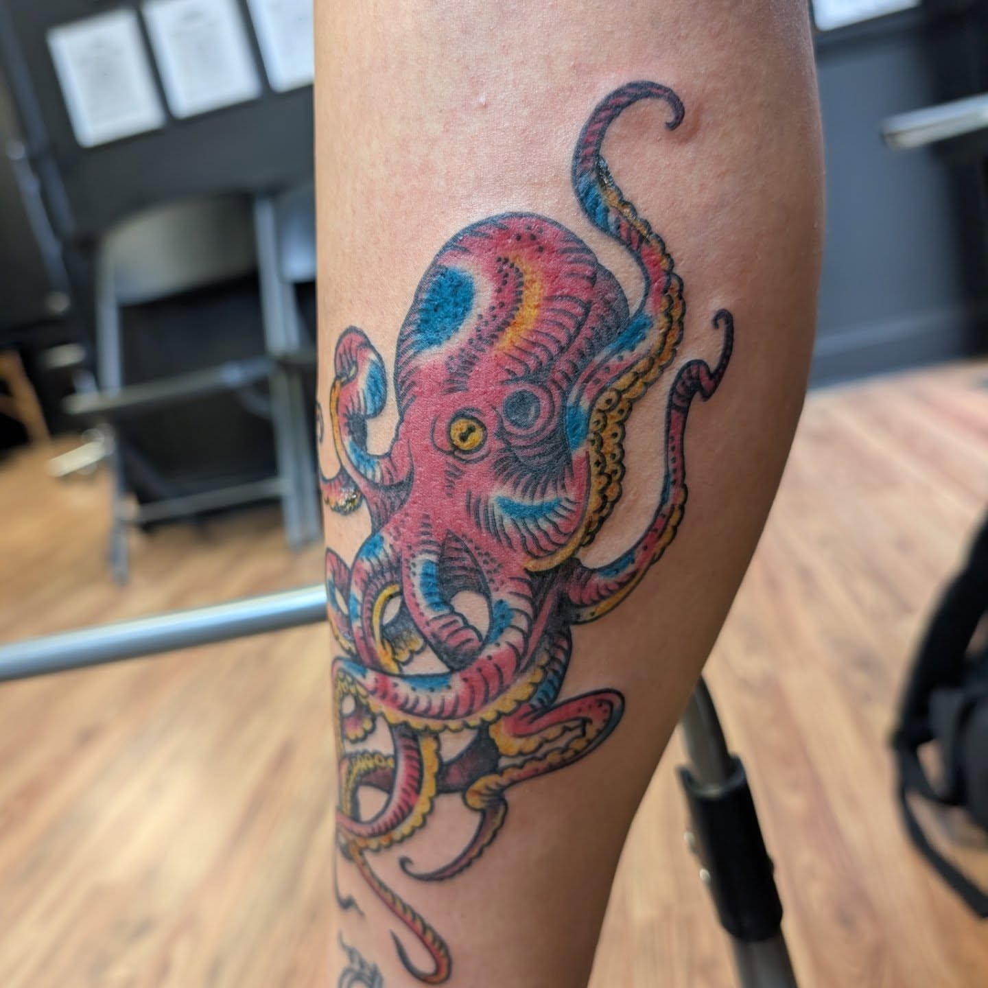 Octopus American traditional tattoo on the forearm by Chad Nuber