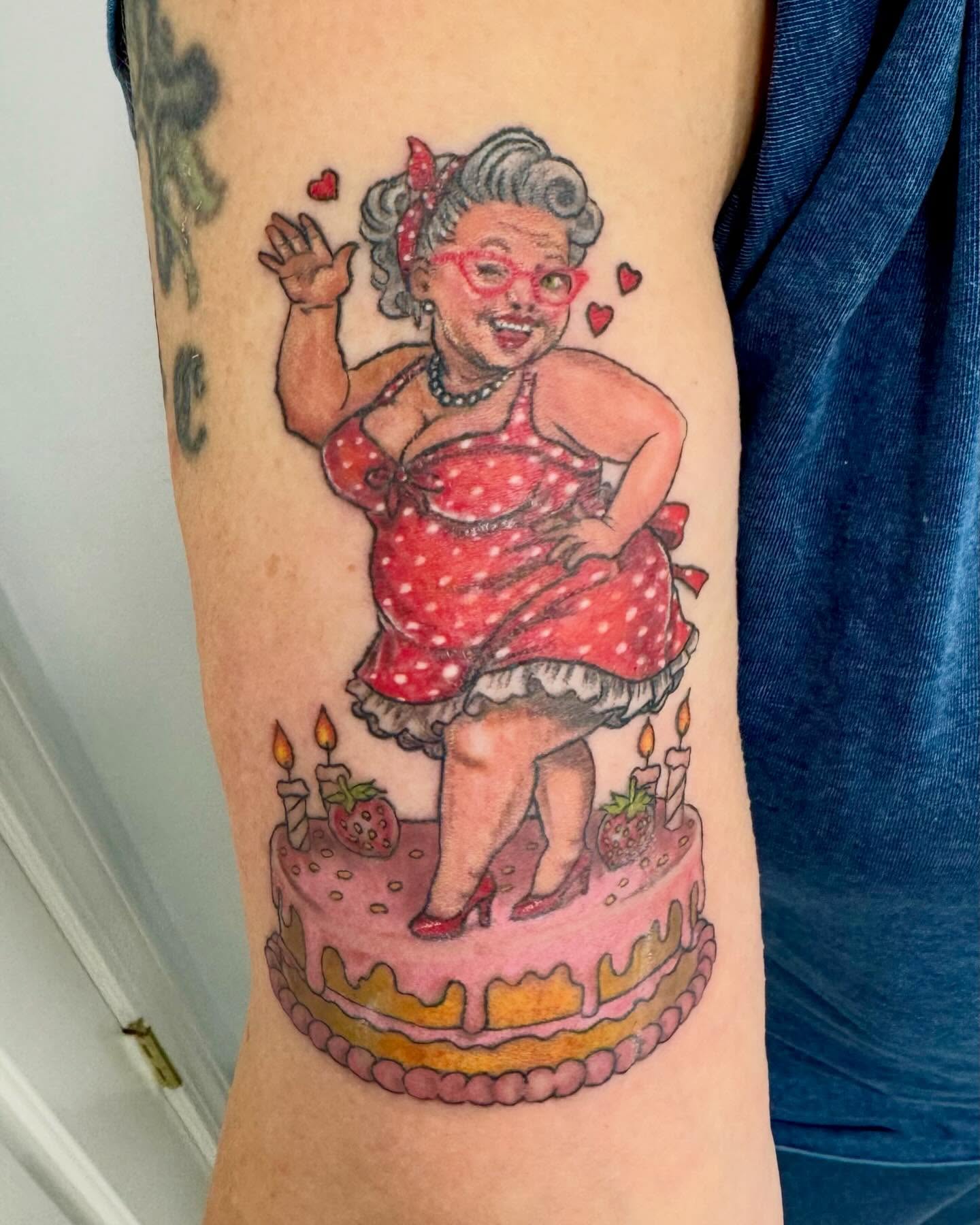 Birthday girl on cake illustrative tattoo on the thigh by Brazun Locker Poloschan