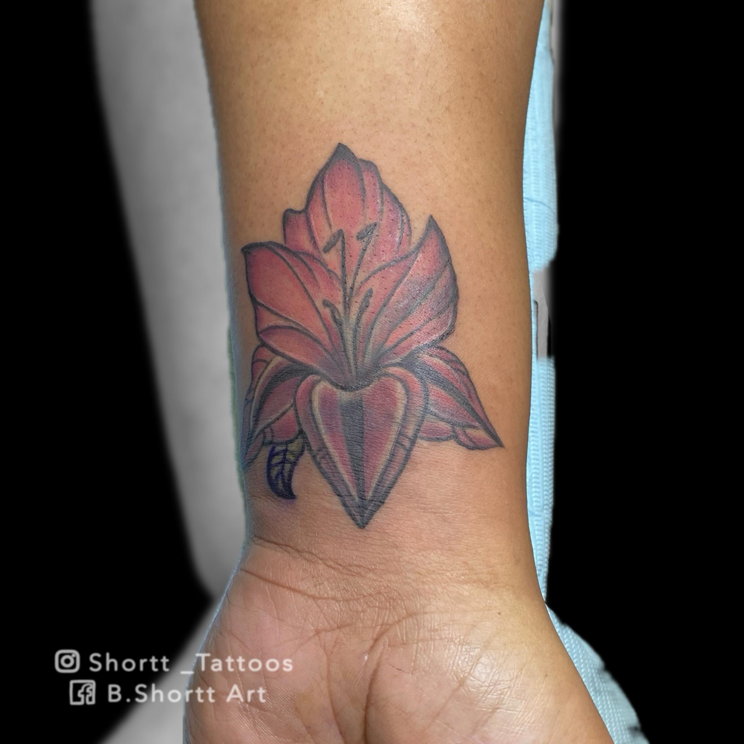 Lily realism tattoo on the forearm by Brie Marie