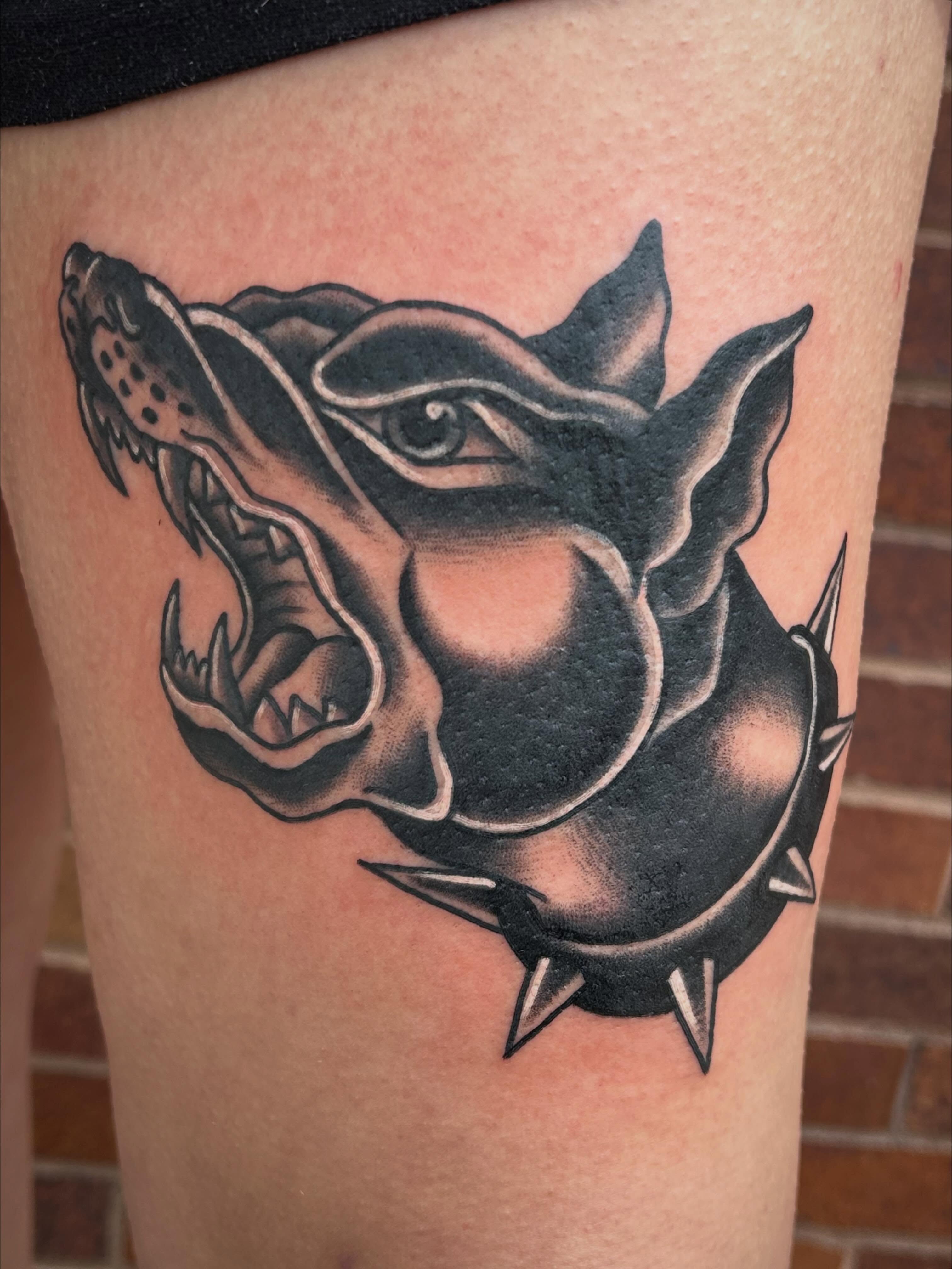 Boar head black and grey tattoo on the thigh by Morgan Hazer Tattoos, Cedar Rapids, Iowa