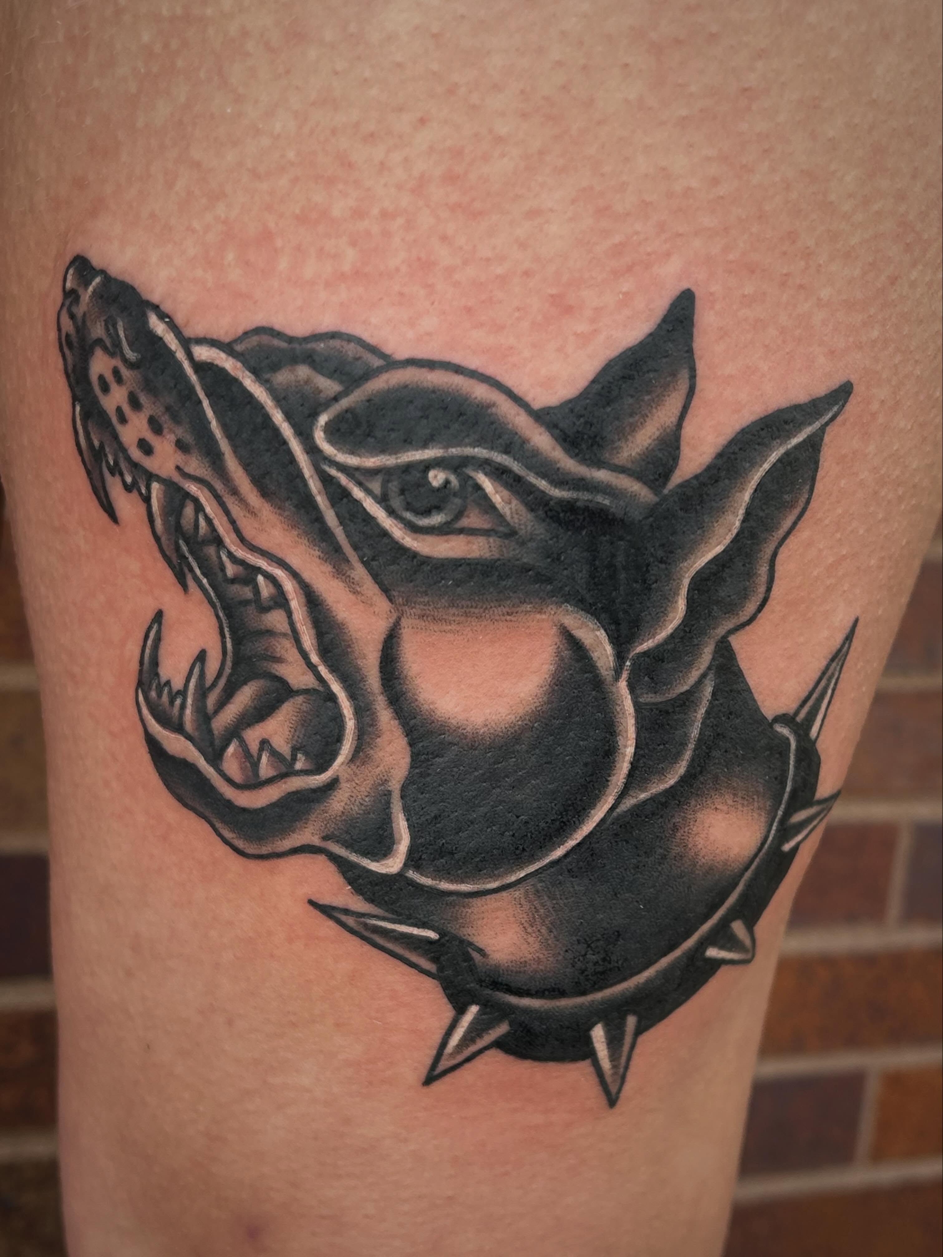 Boar head black and grey tattoo on the thigh by Morgan Hazer Tattoos, Cedar Rapids, Iowa