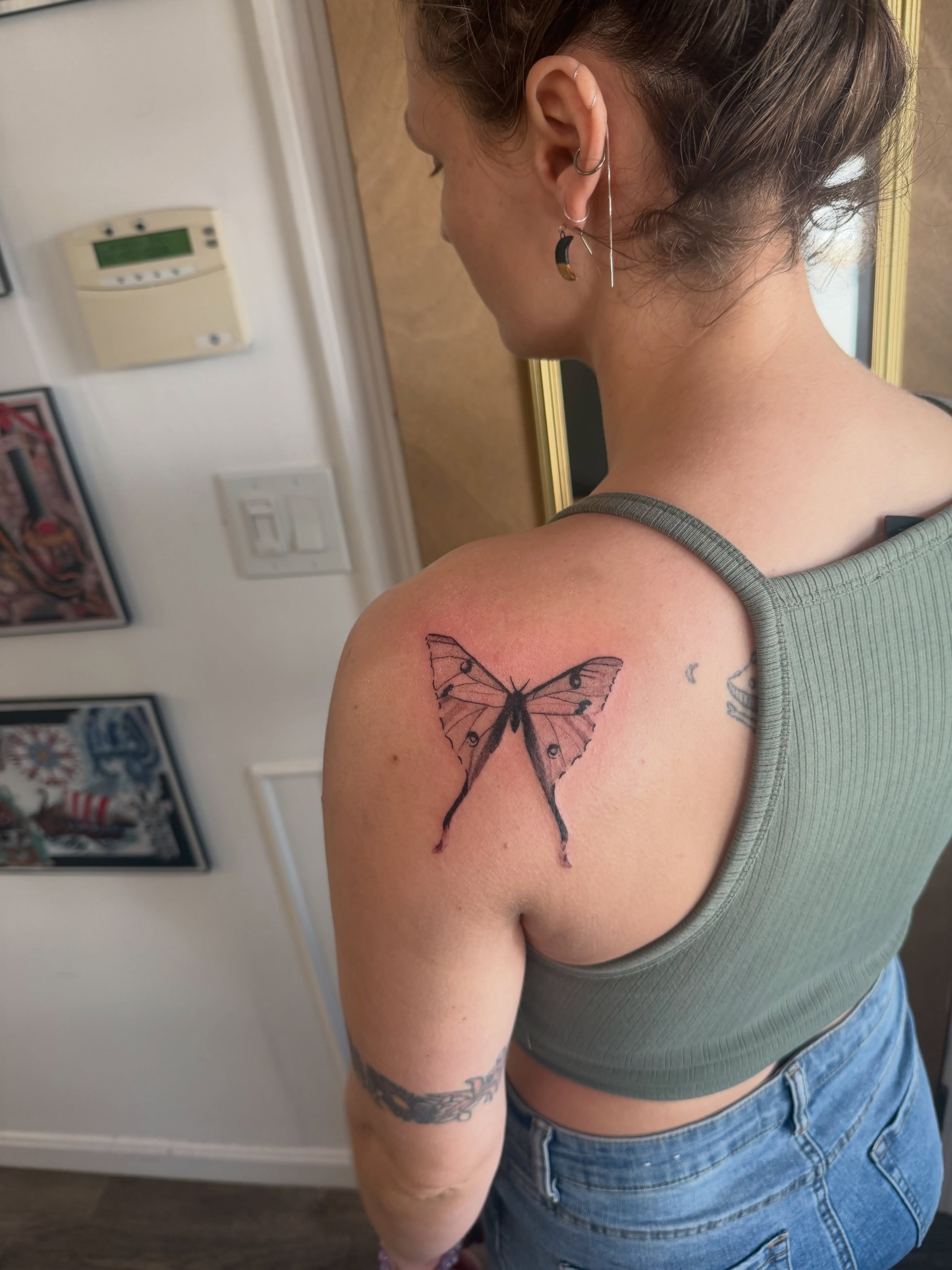Butterfly realism tattoo on the shoulder by Alaska