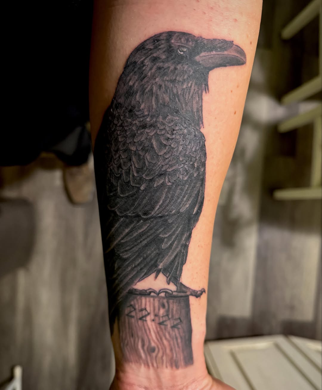 Crow black and grey tattoo on the forearm by Patrick Delvar