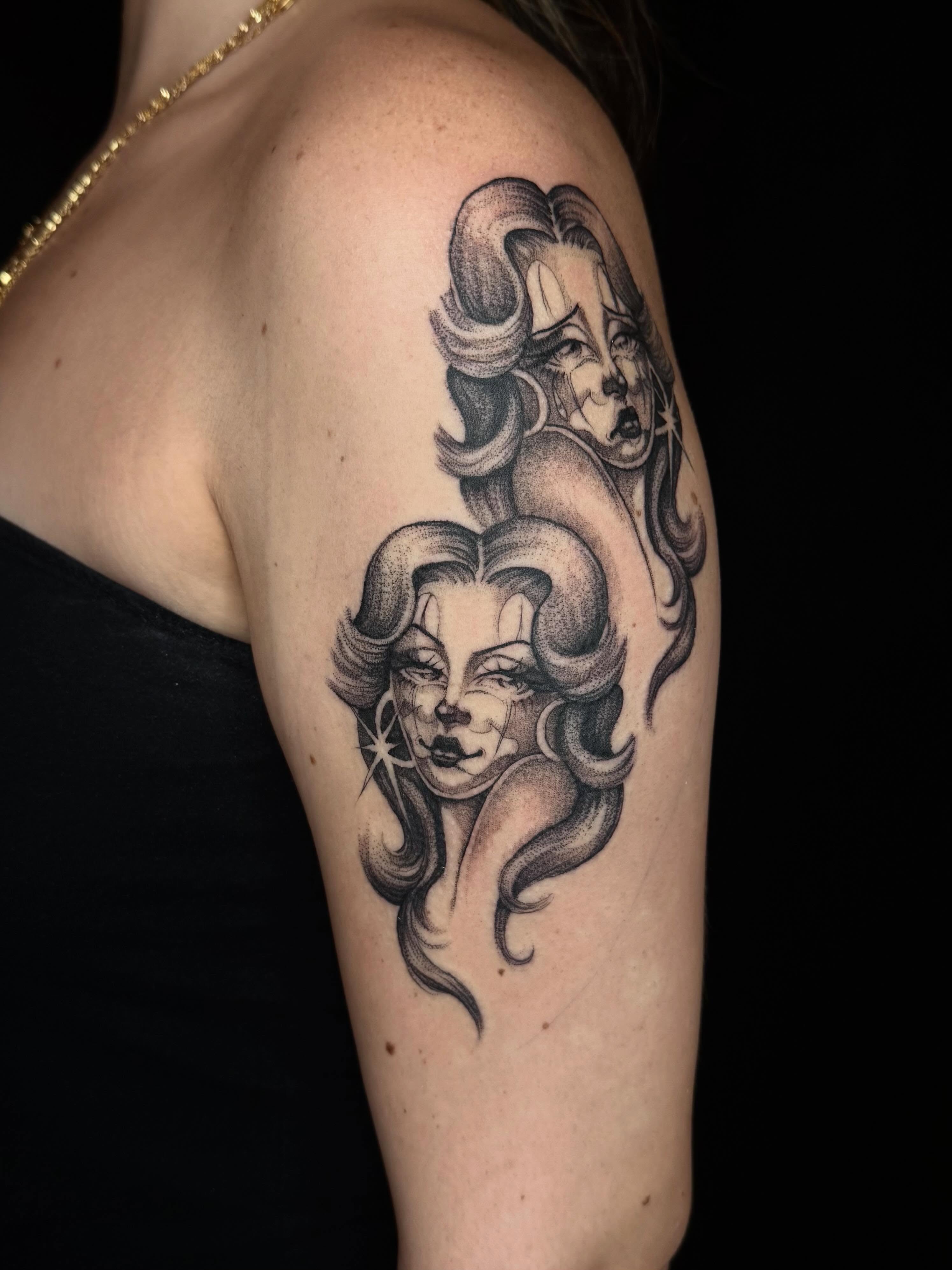 Female faces black and grey tattoo on the shoulder by Isabella π€