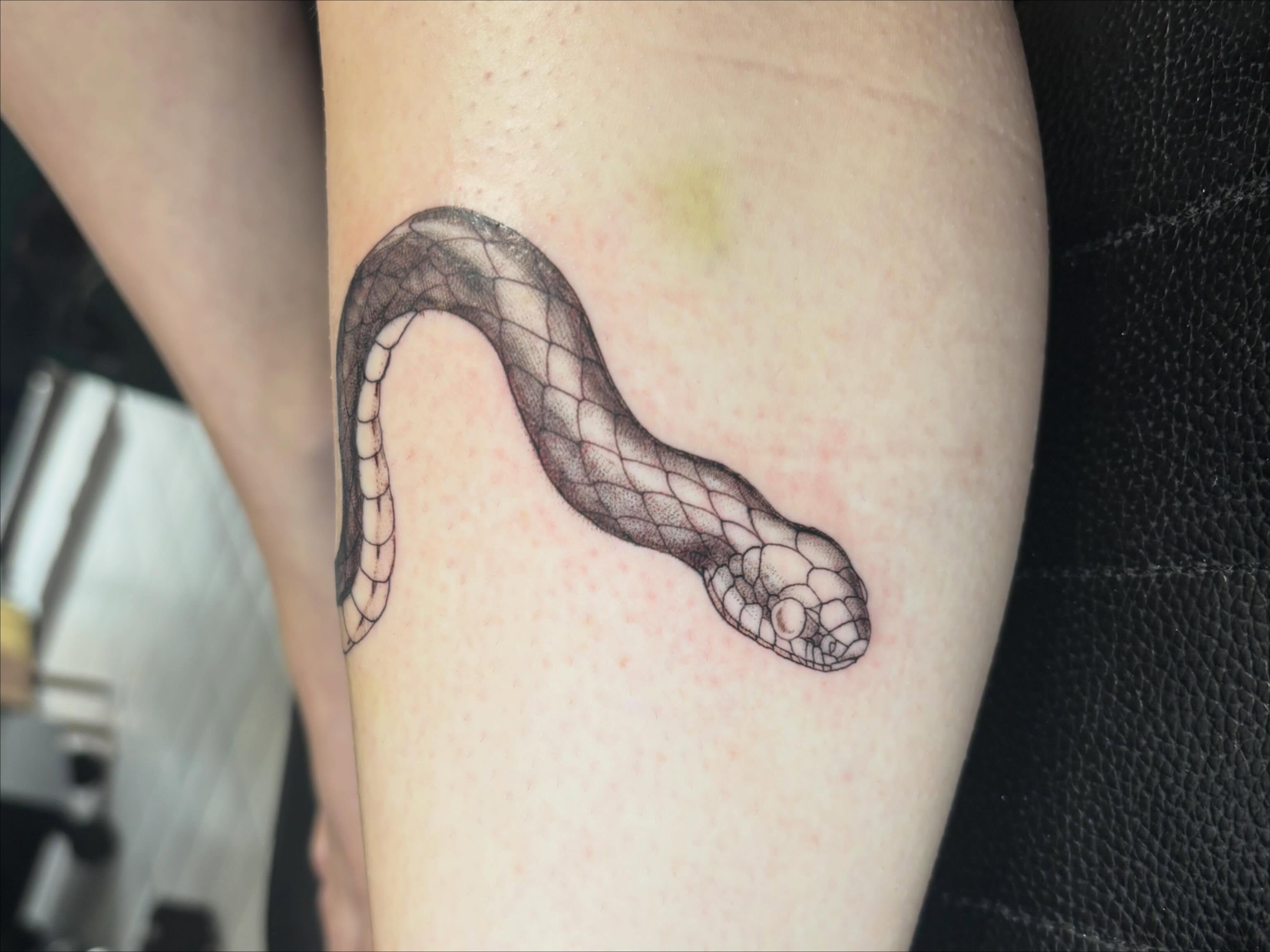 Tattoo by @tankgurl_tattoos — black_and_grey, realism