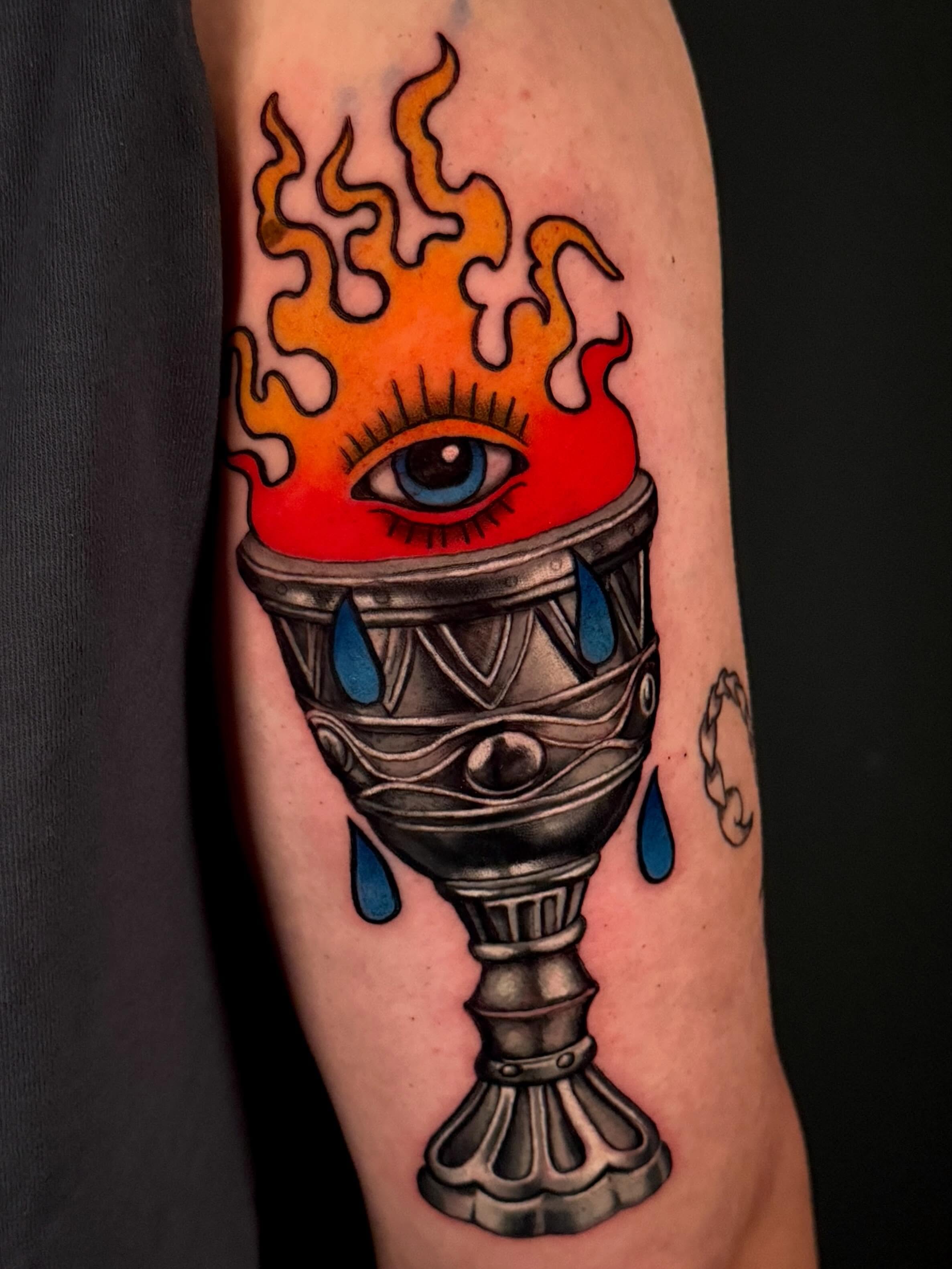 Flaming chalice with eye neo-traditional tattoo on the forearm by Dallas Tattoo Artist