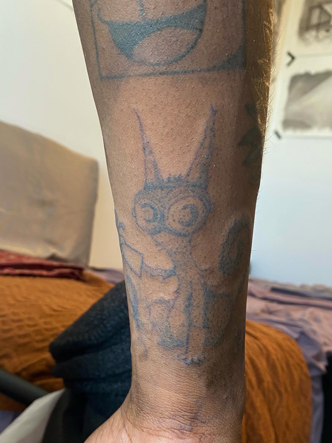 Cartoon cat new school tattoo on the forearm by @feverfeverish