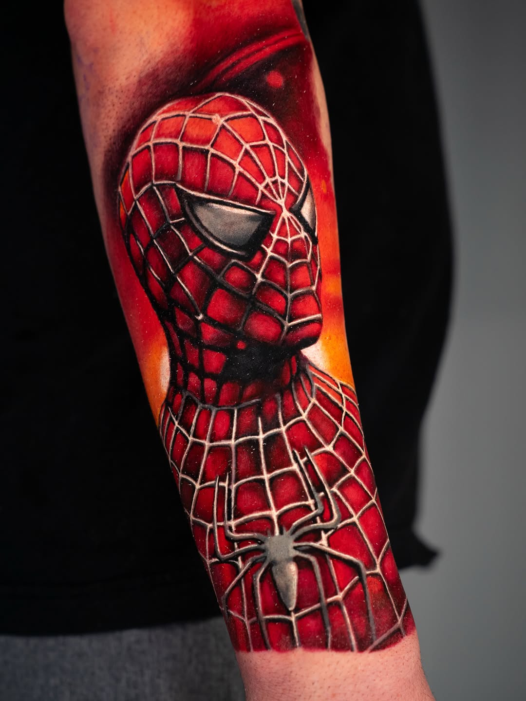 Spiderman portrait new school tattoo on the forearm by Nate