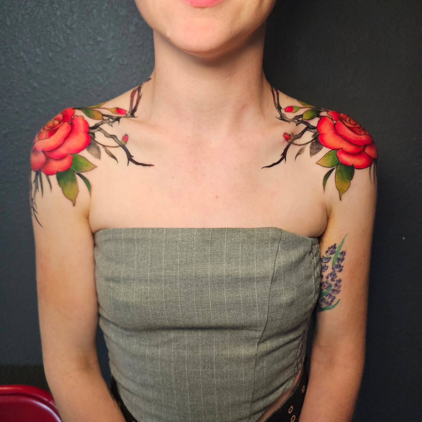 Floral realism tattoo on the shoulder by Adriannah Esparza