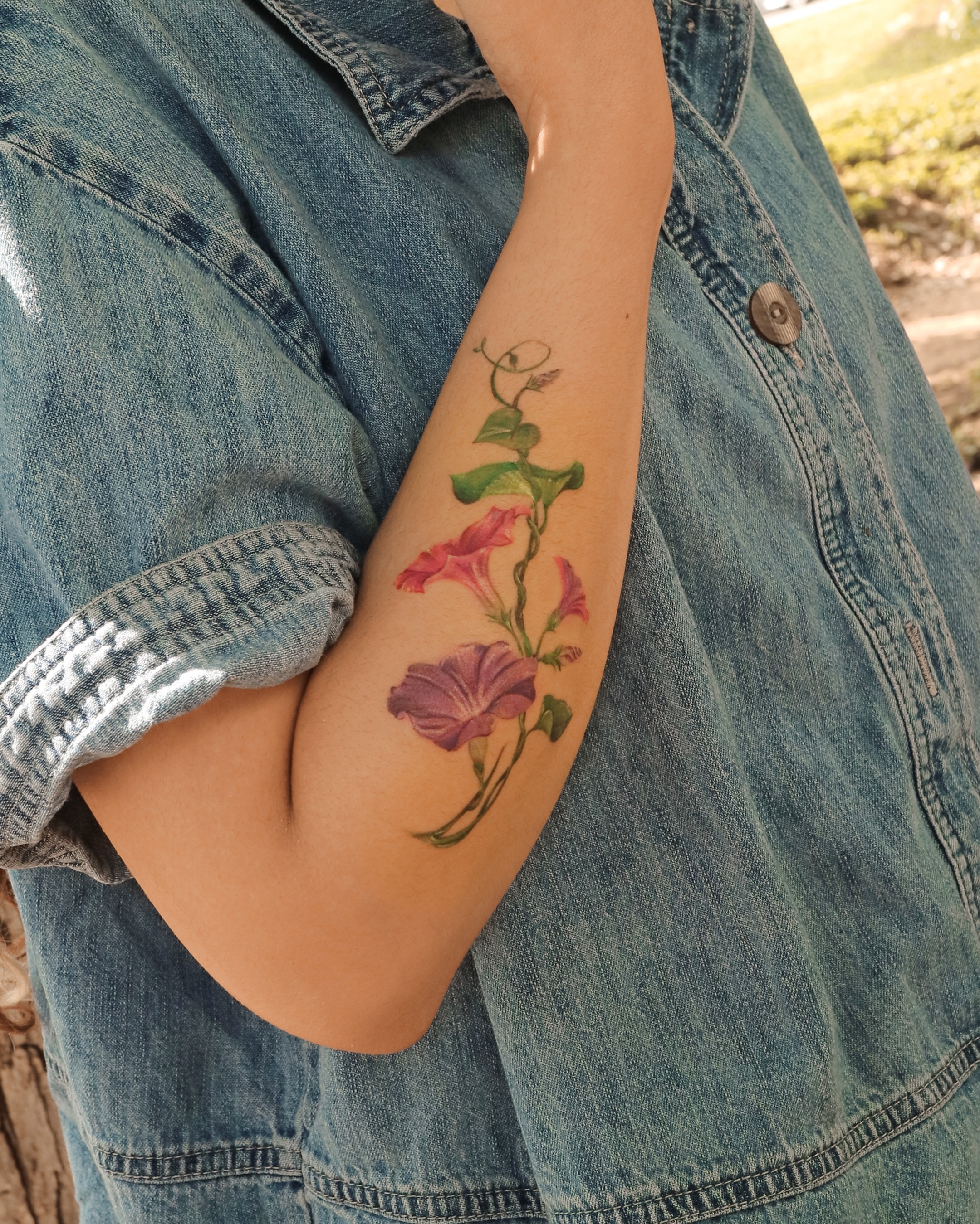 Morning glory flowers realism tattoo on the forearm by Aroha