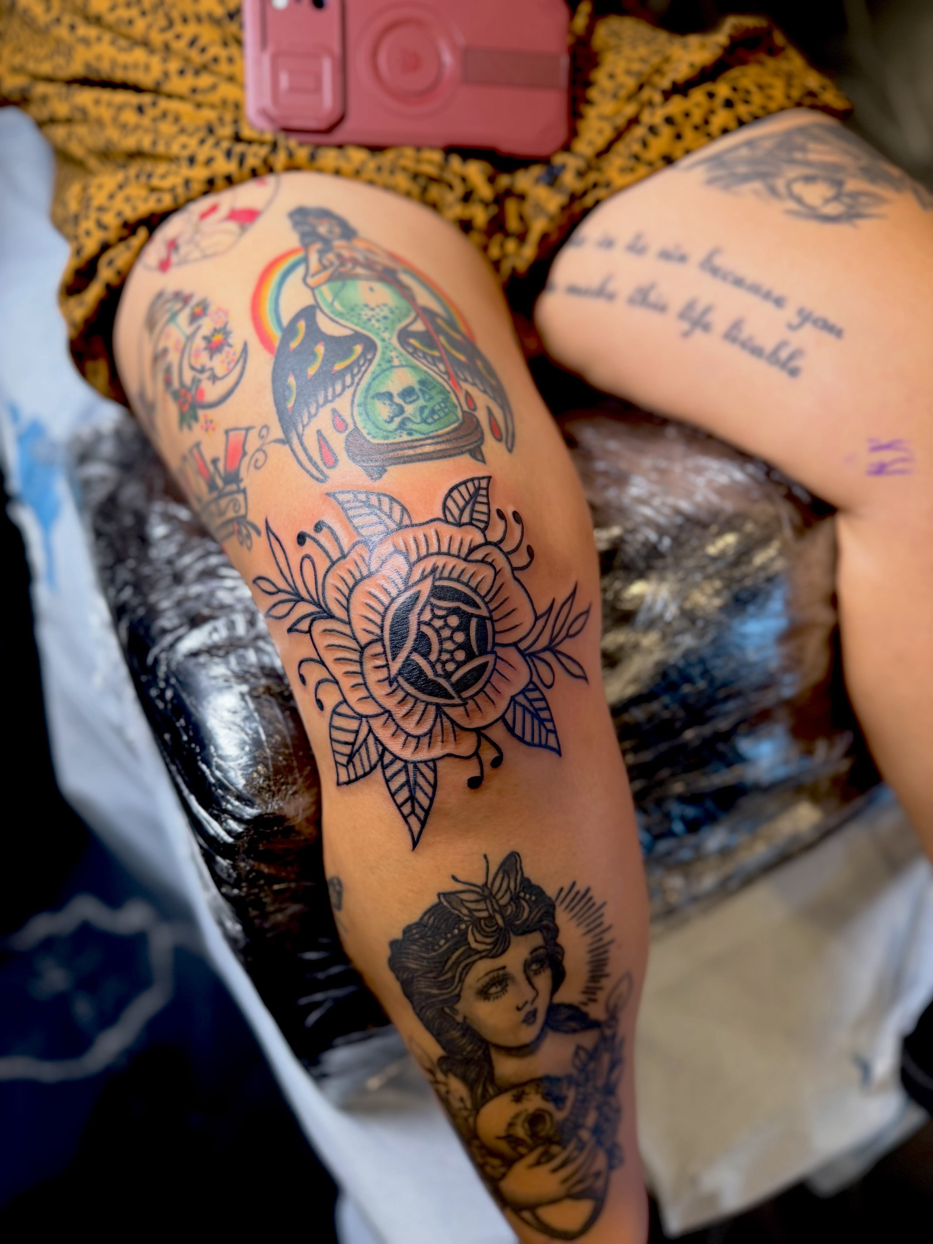 Rose American traditional tattoo on the thigh by Barbara Gonzalez