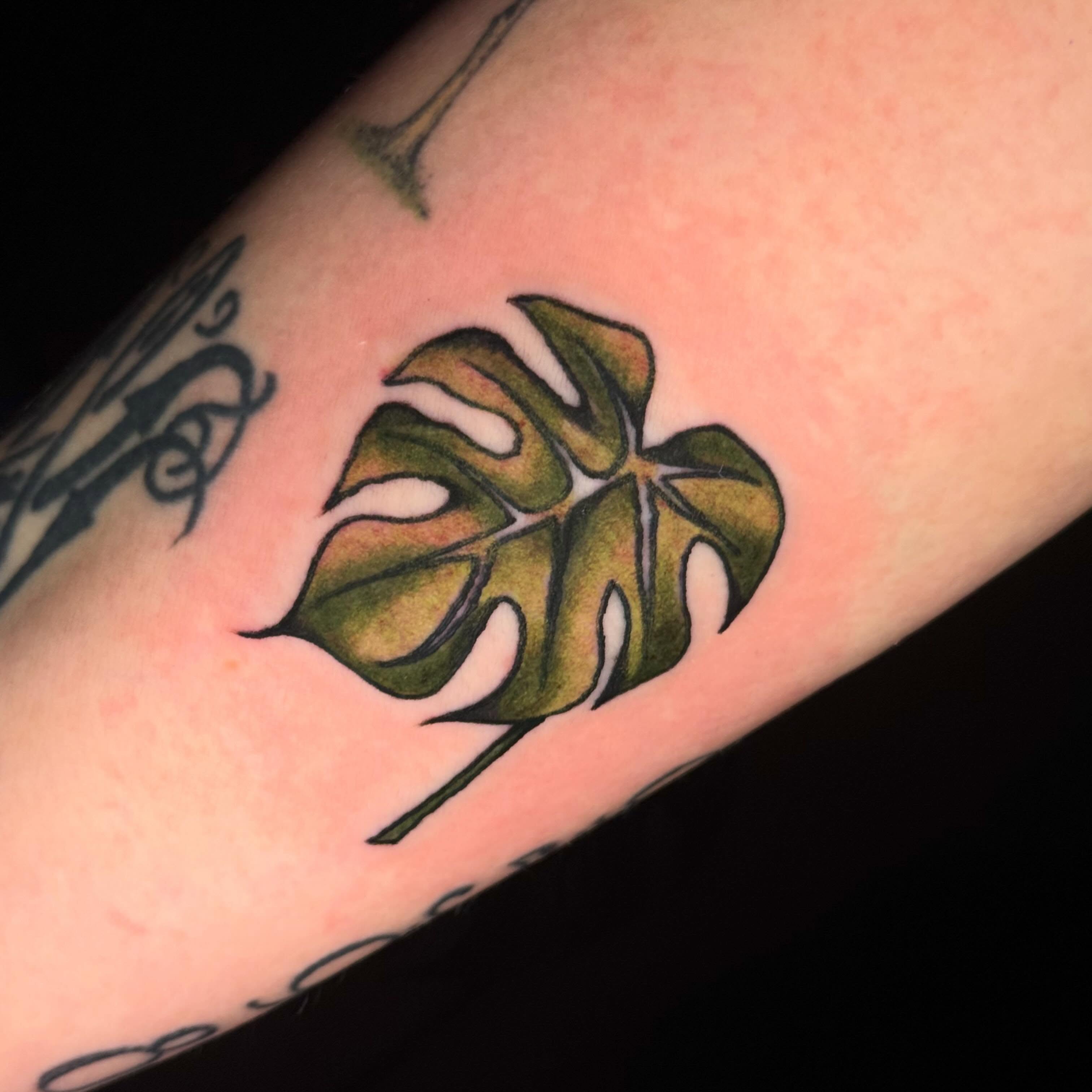 Monstera leaf realism tattoo on the forearm by Mallory Brown