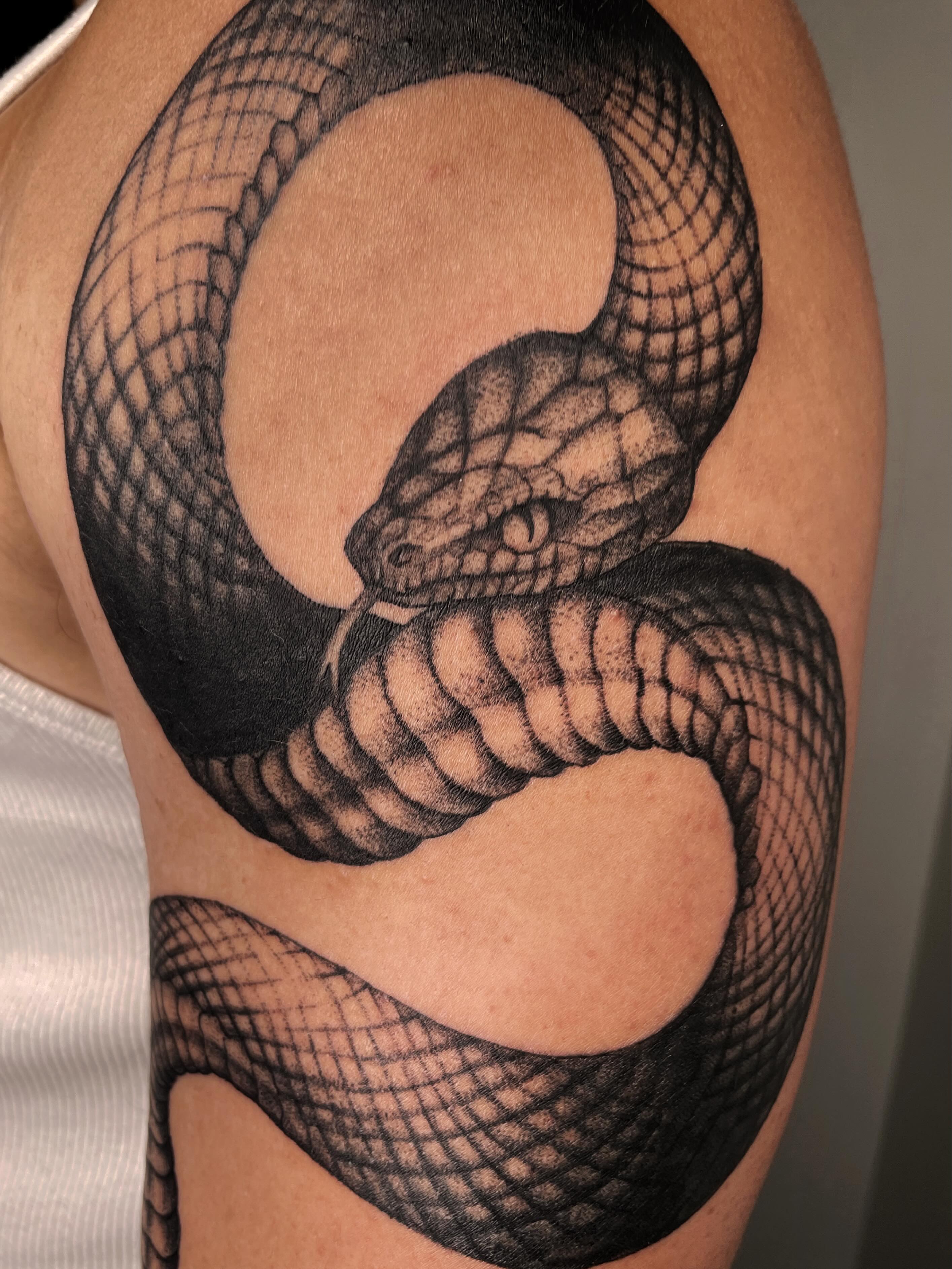 Snake black and grey tattoo on the shoulder by Vash